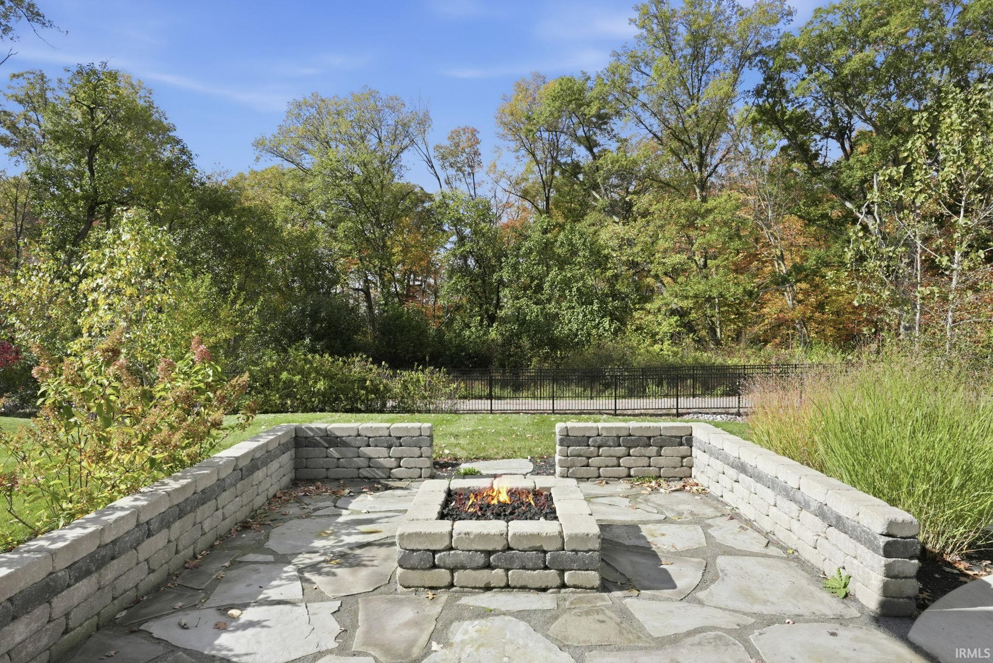 View of patio with a wooded view
