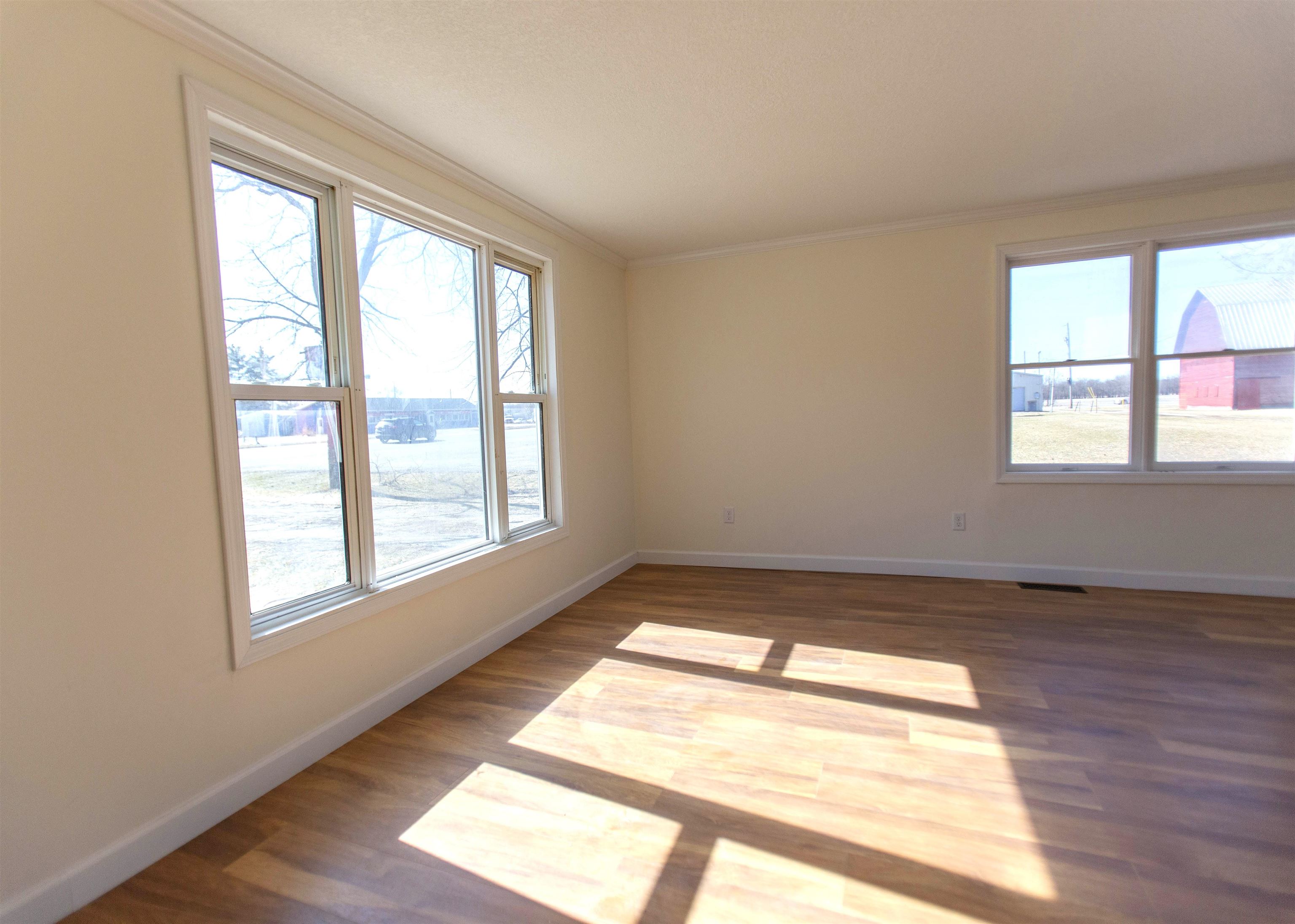 Windows that are on the front and side of the house