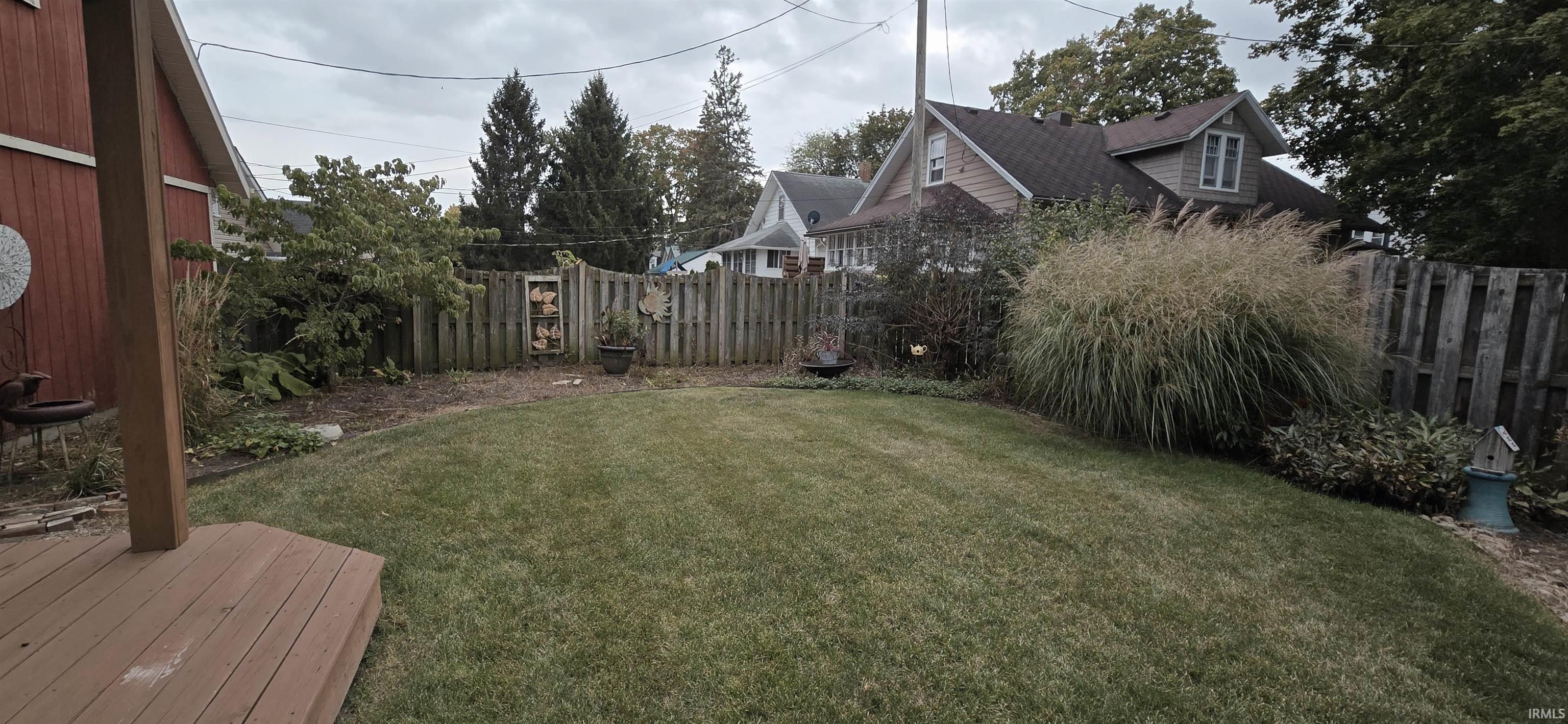 View of fenced backyard