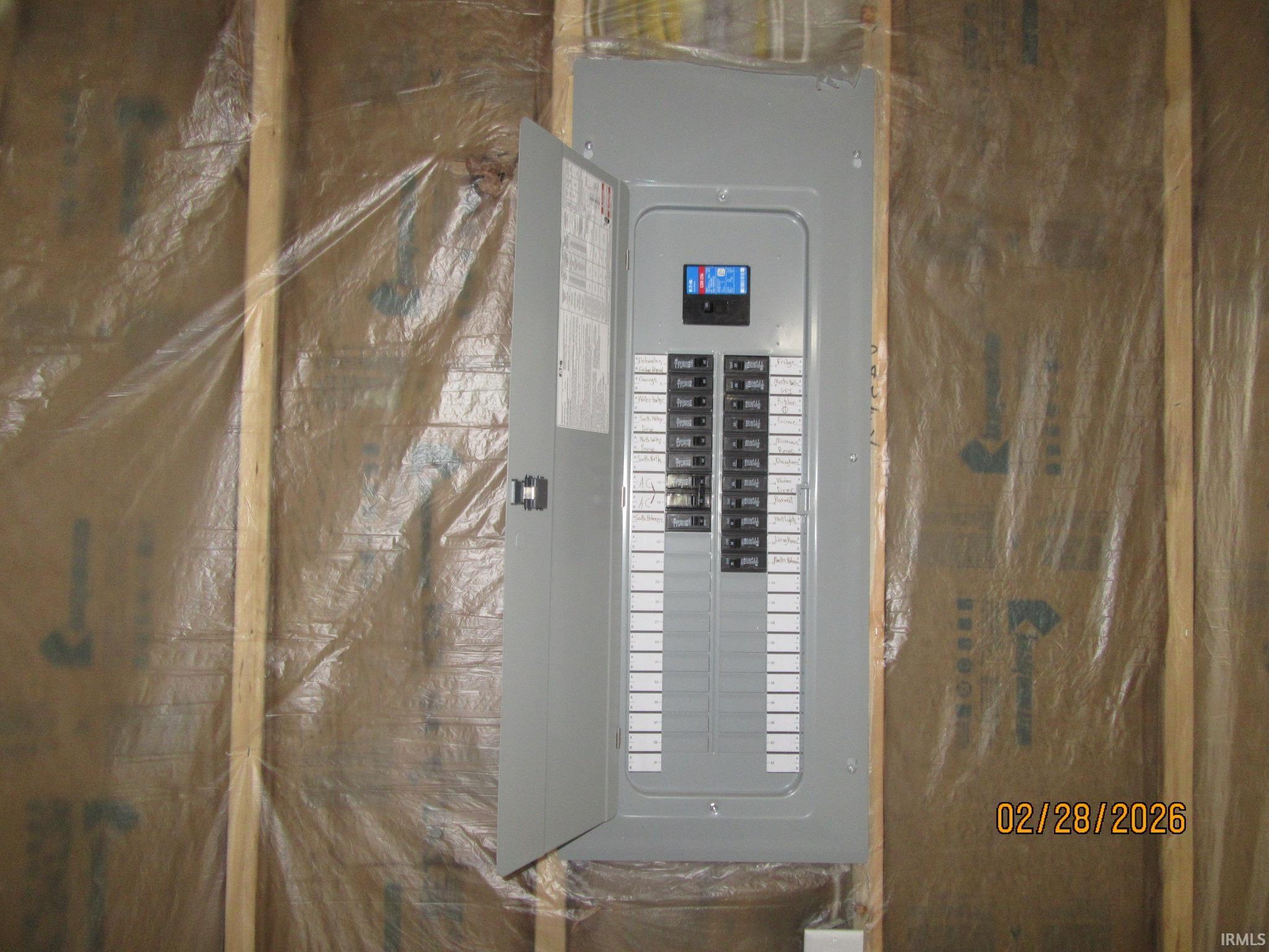 Utility room featuring electric panel