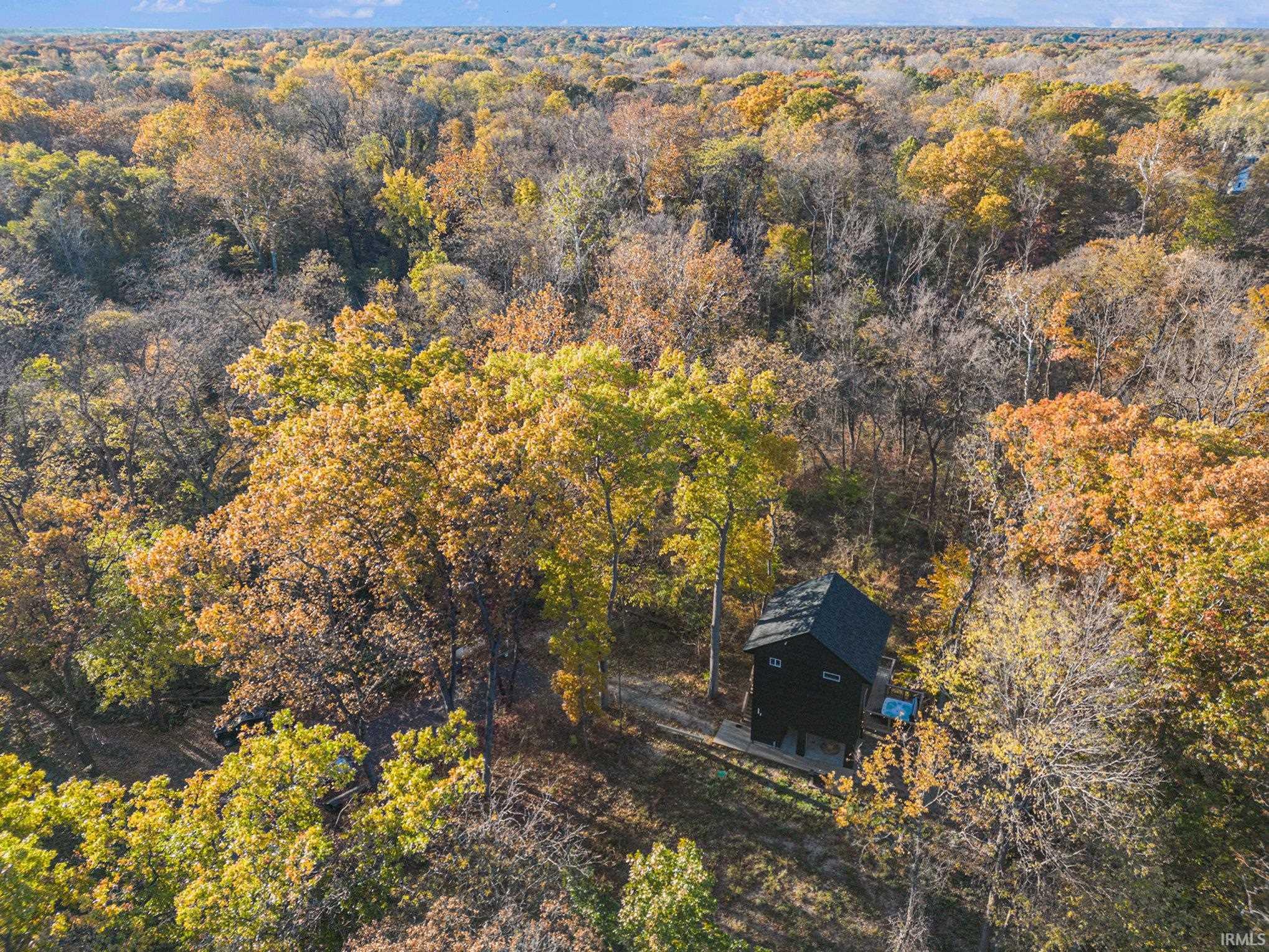 Drone / aerial view of a heavily wooded area