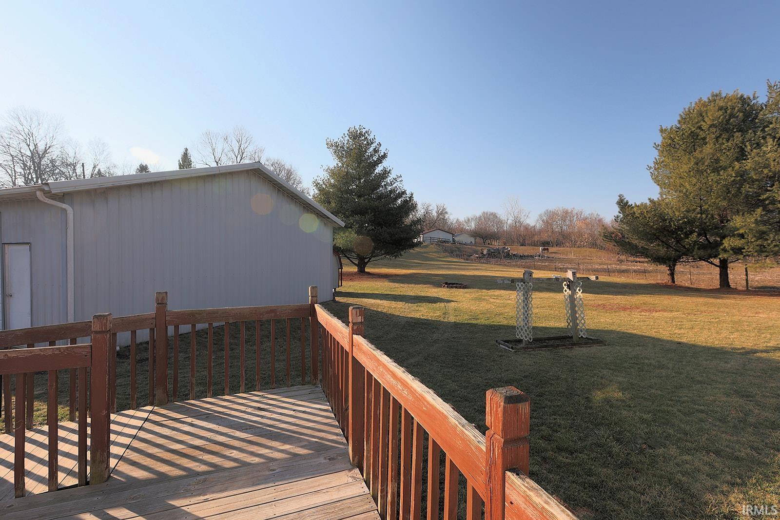 Wooden deck with a lawn