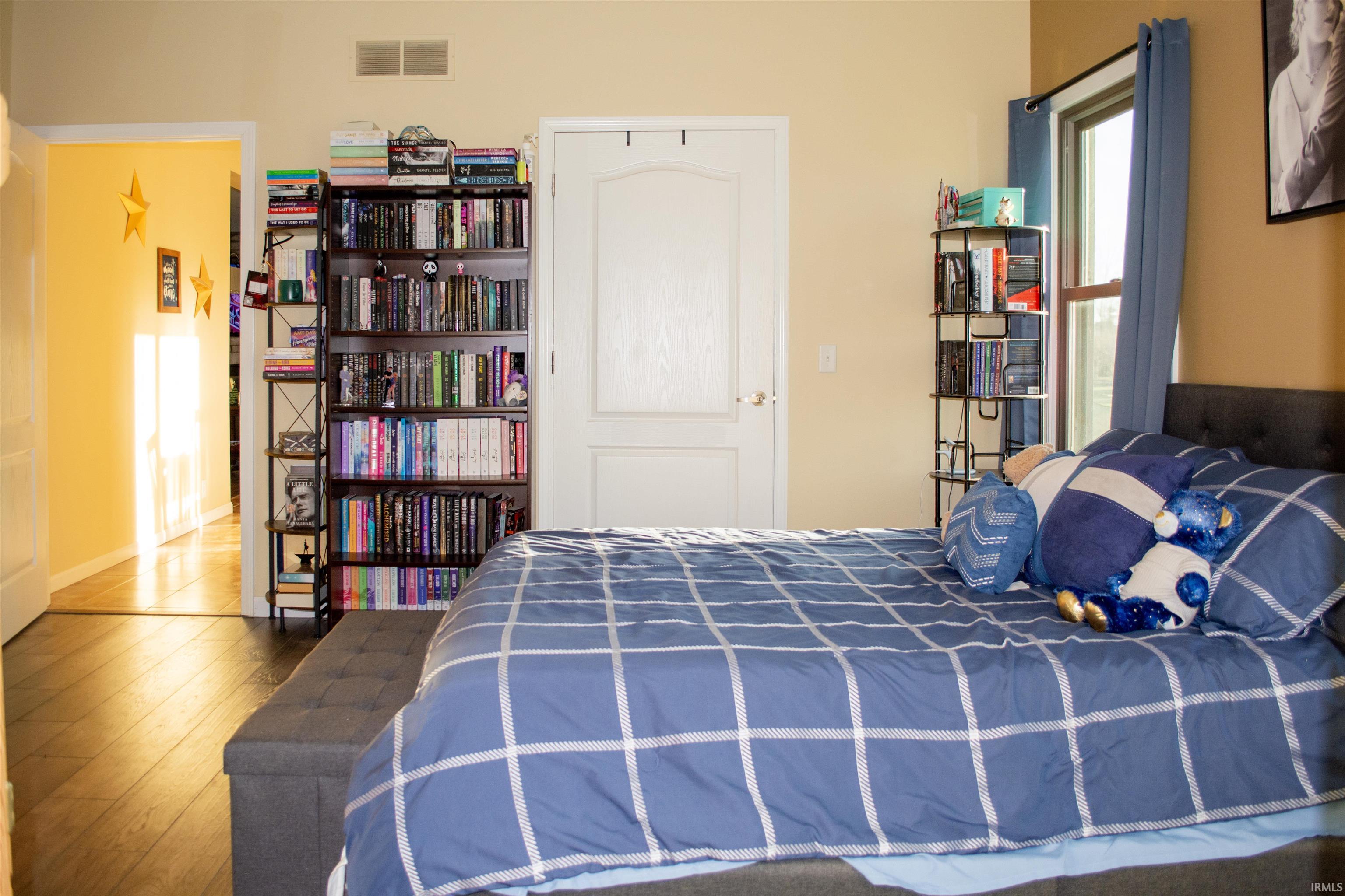 Bedroom featuring wood finished floors