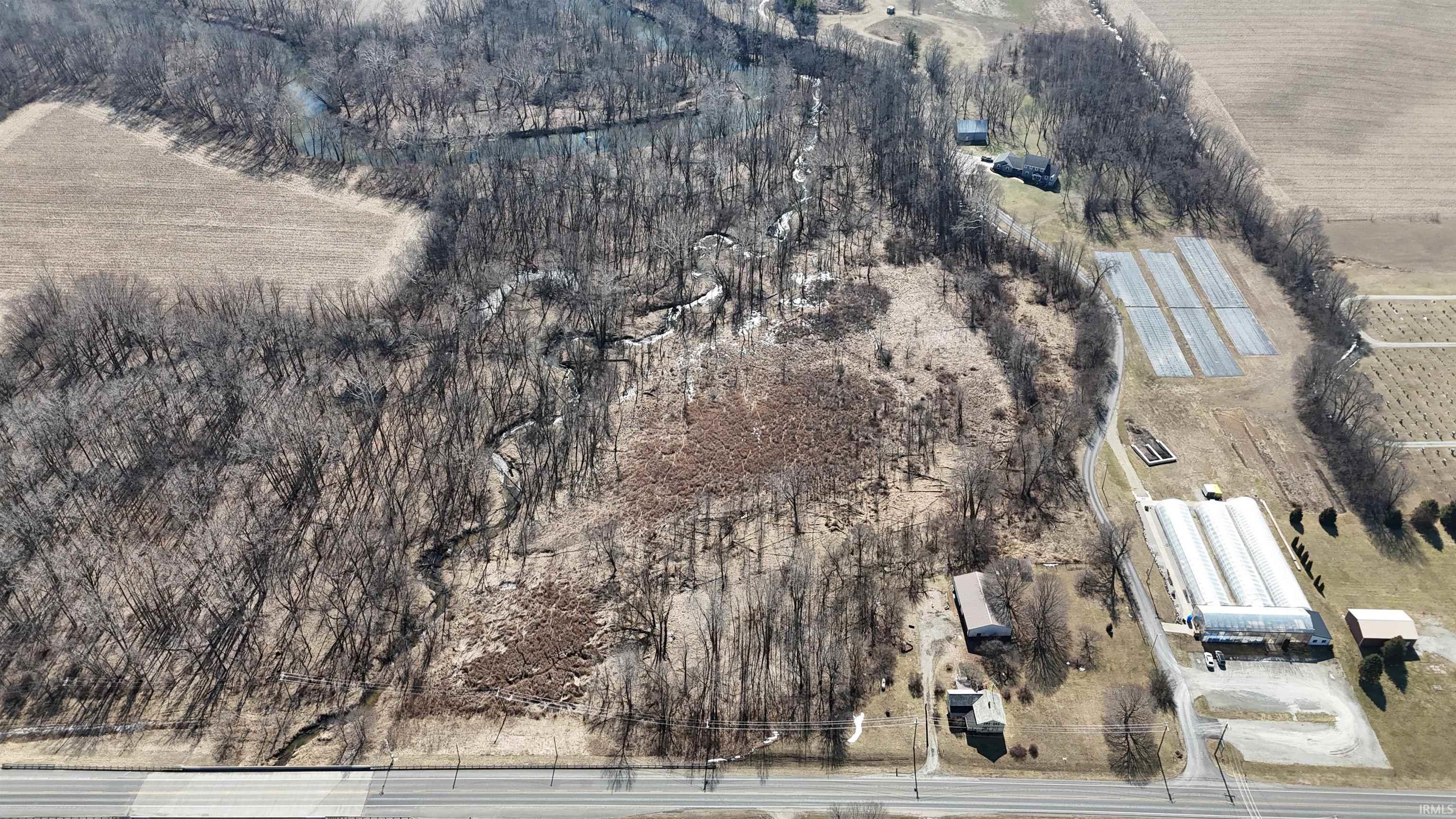 View of property location with rural landscape and extensive farmland