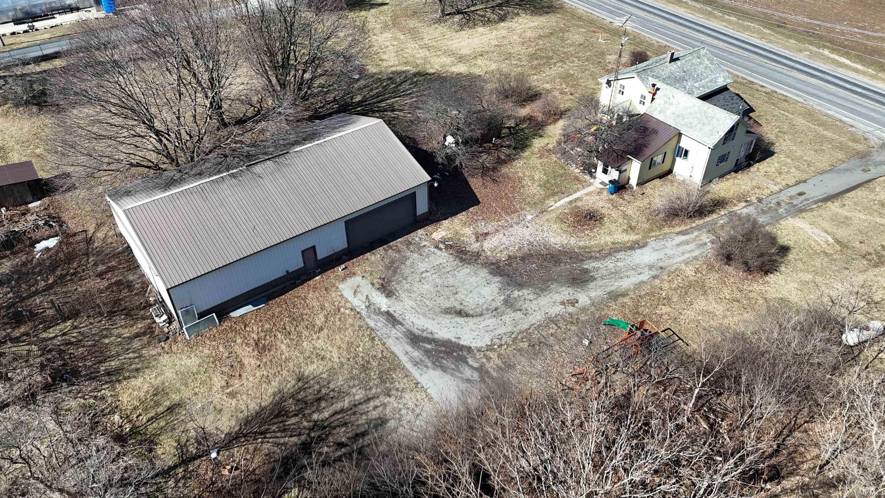 Aerial view of property and surrounding area