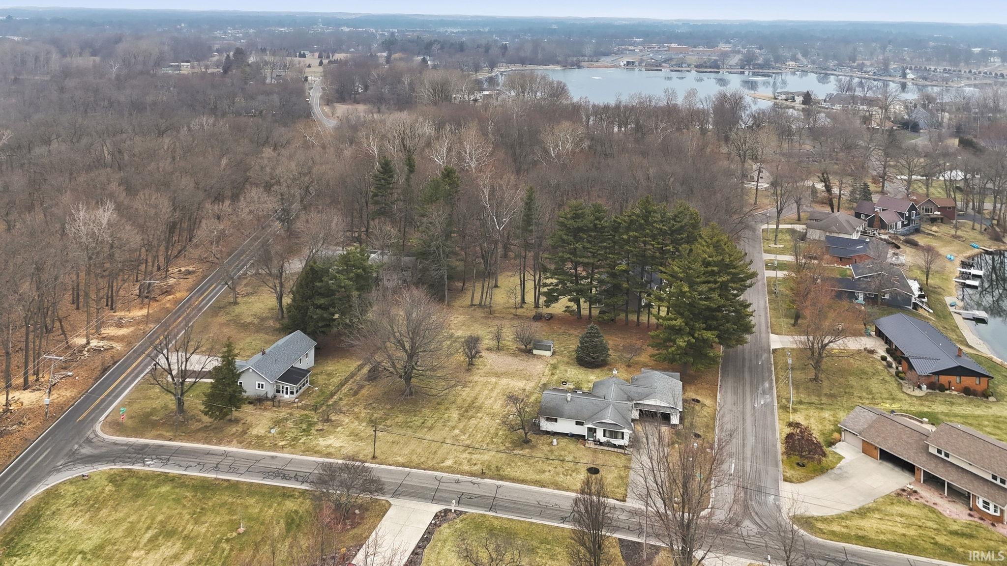 Aerial view of residential area with a large body of water