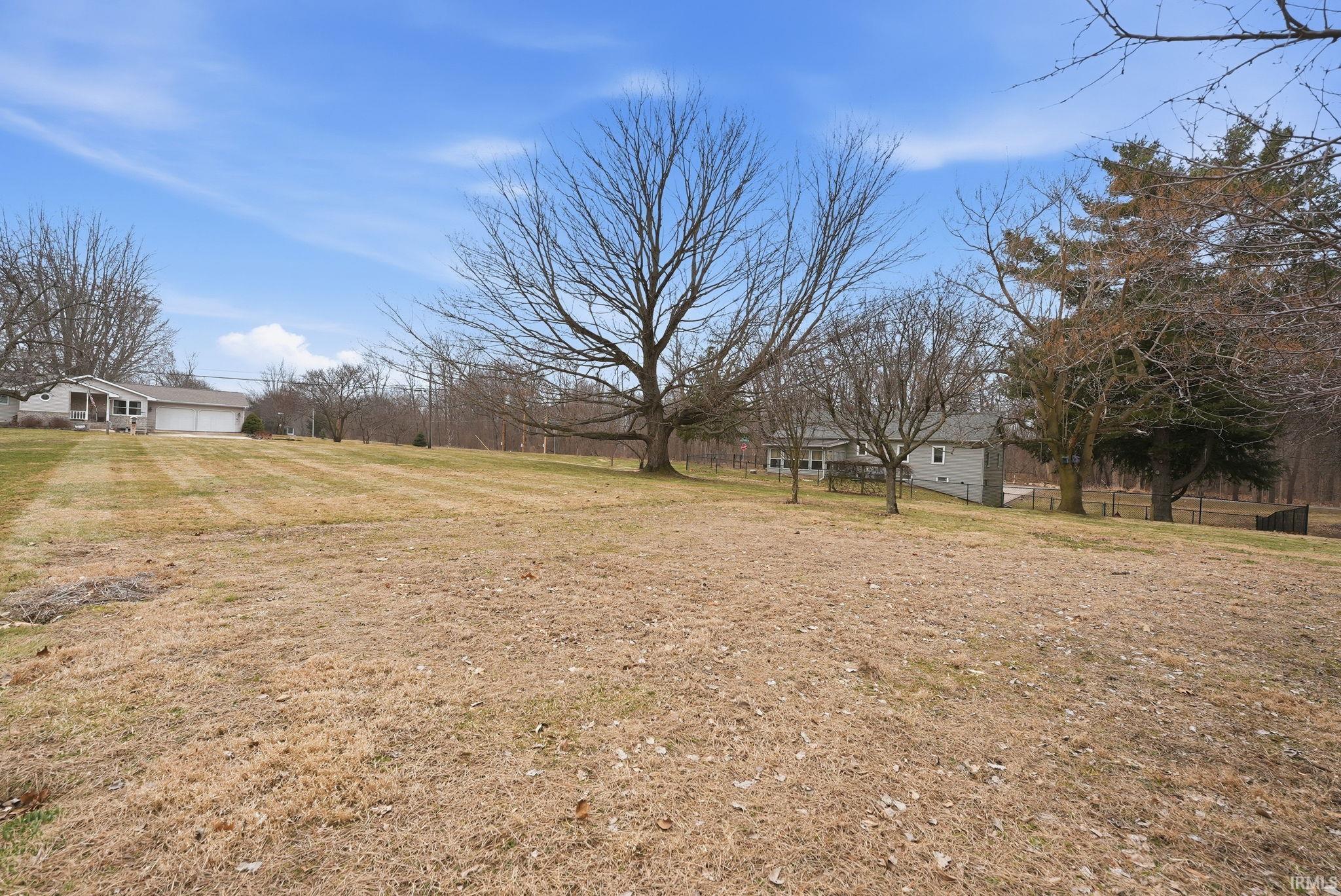 View of yard featuring a garage