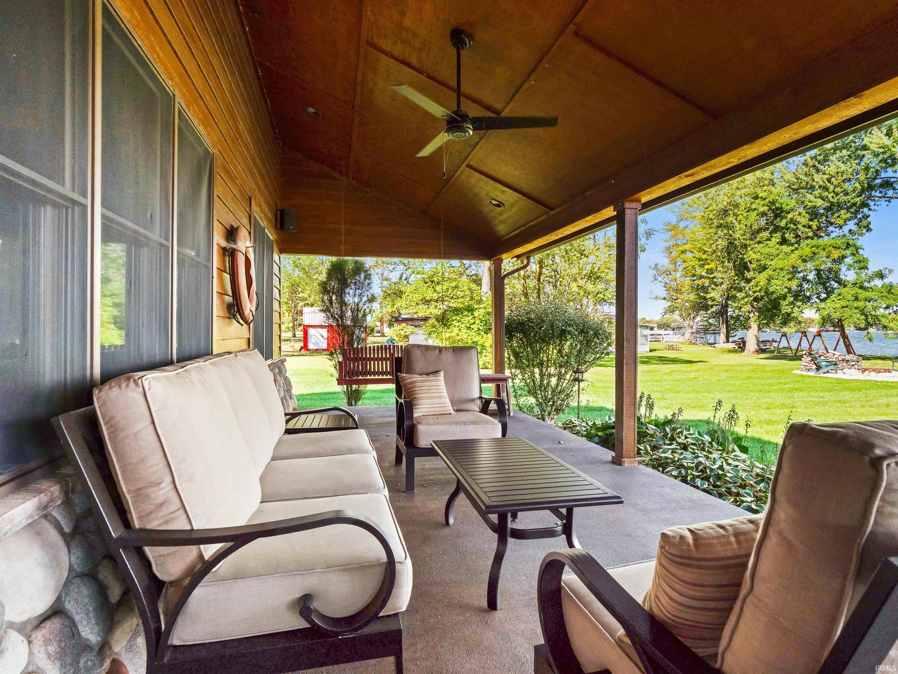 View of patio featuring ceiling fan and an outdoor lounge area