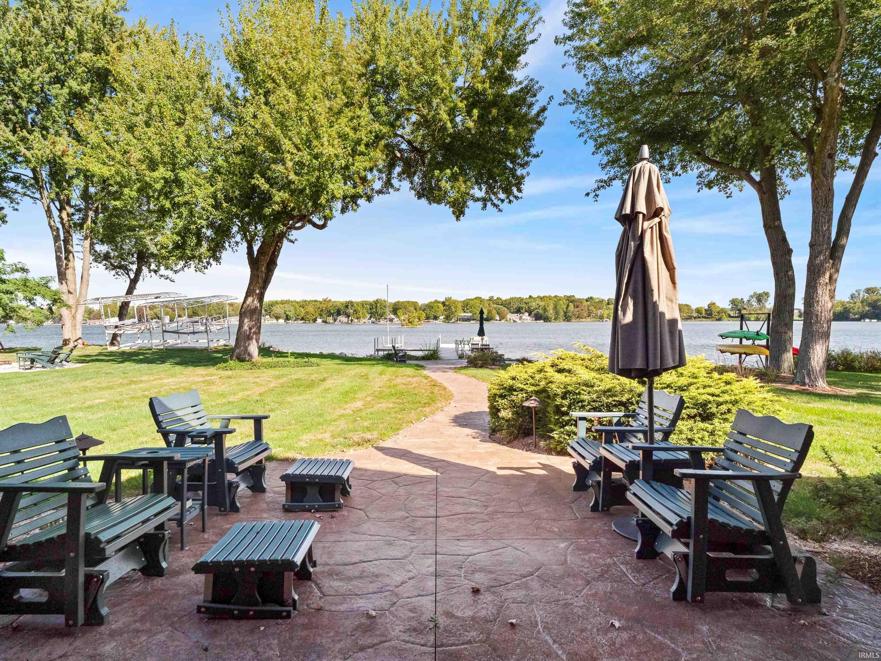 View of patio / terrace with a water view