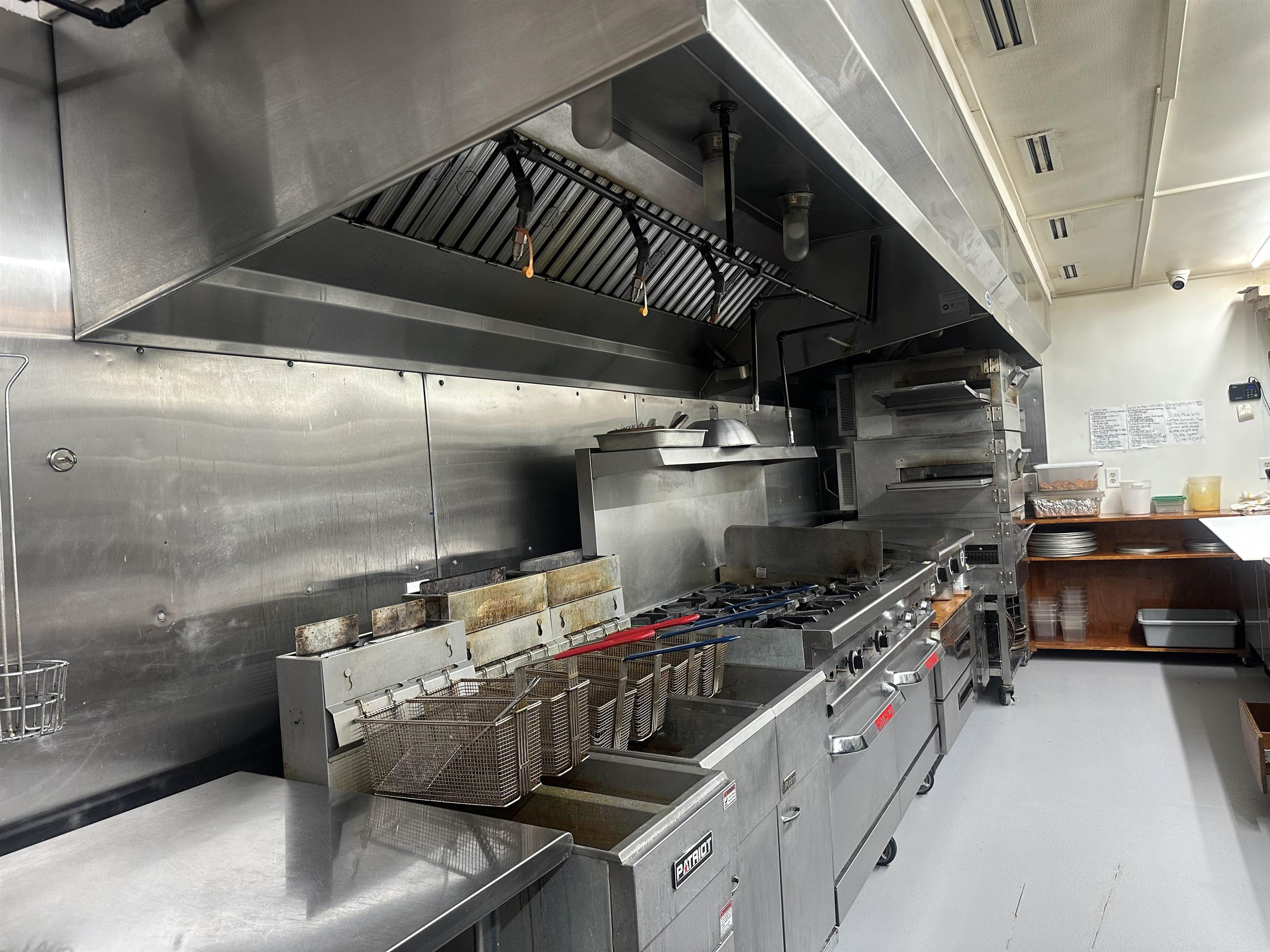 Kitchen featuring stainless steel countertops