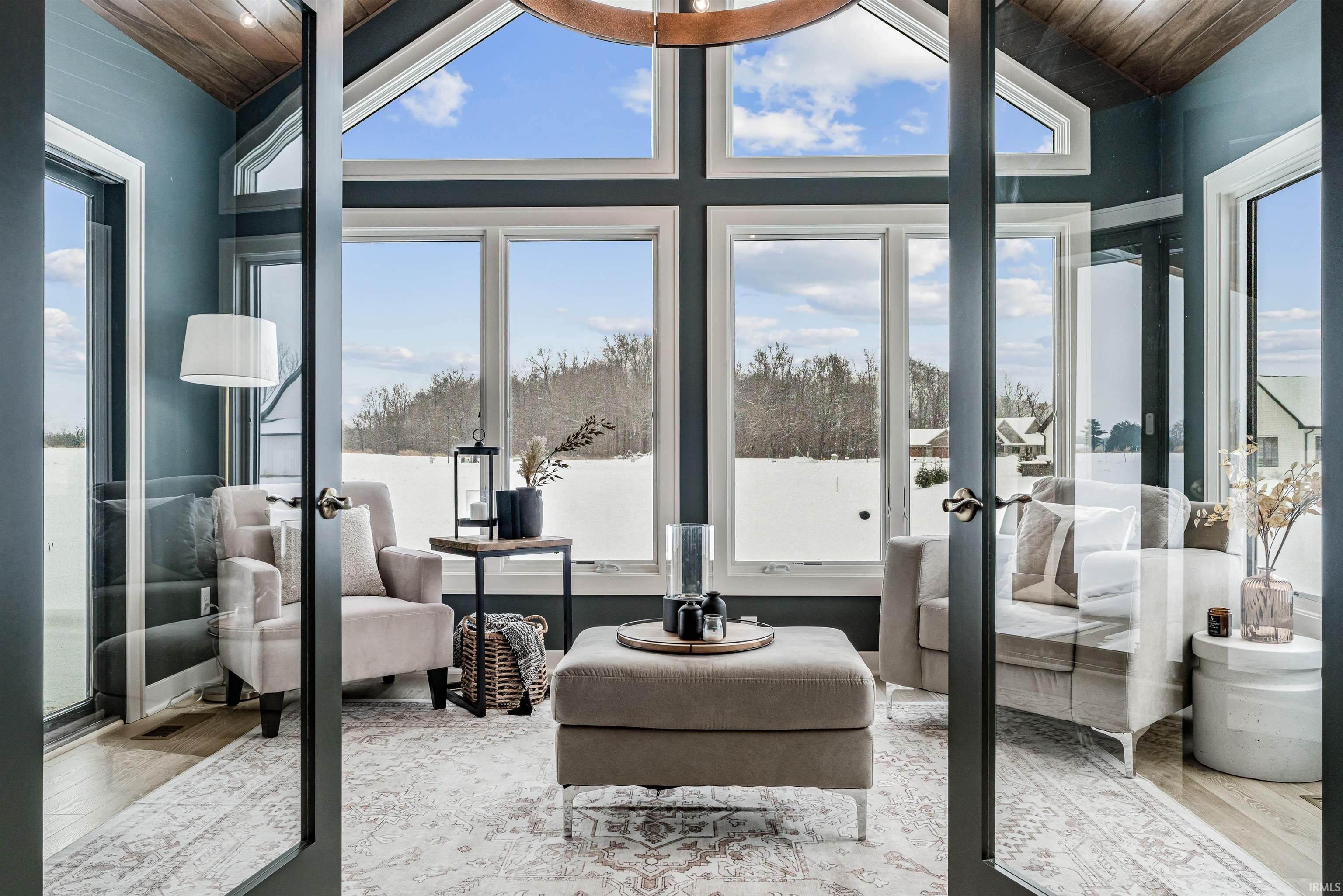 Sunroom with vaulted ceiling