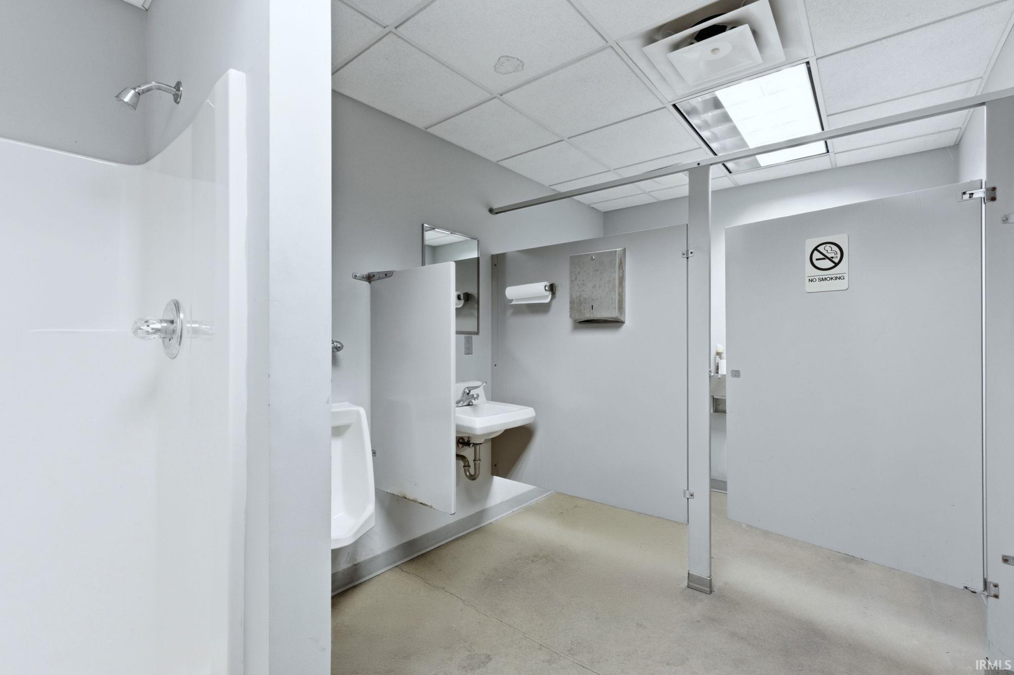 Bathroom with a paneled ceiling