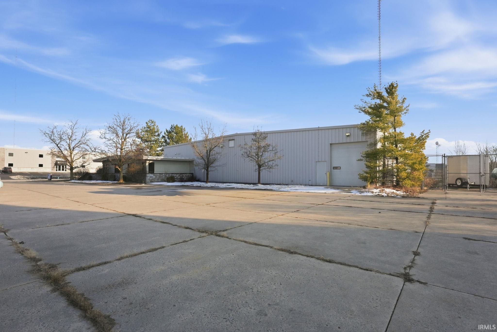 View of property featuring a garage