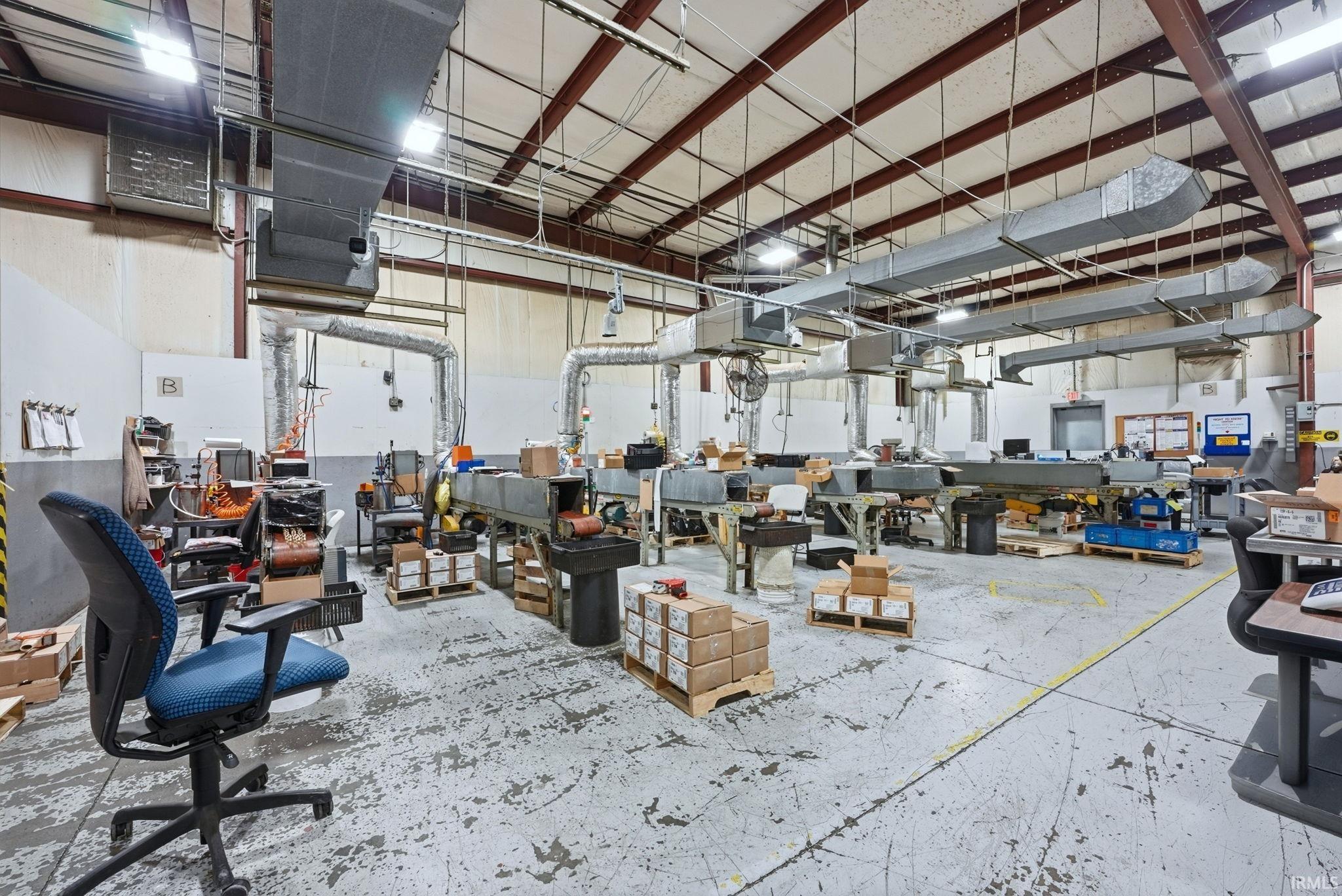 Miscellaneous room with a workshop area