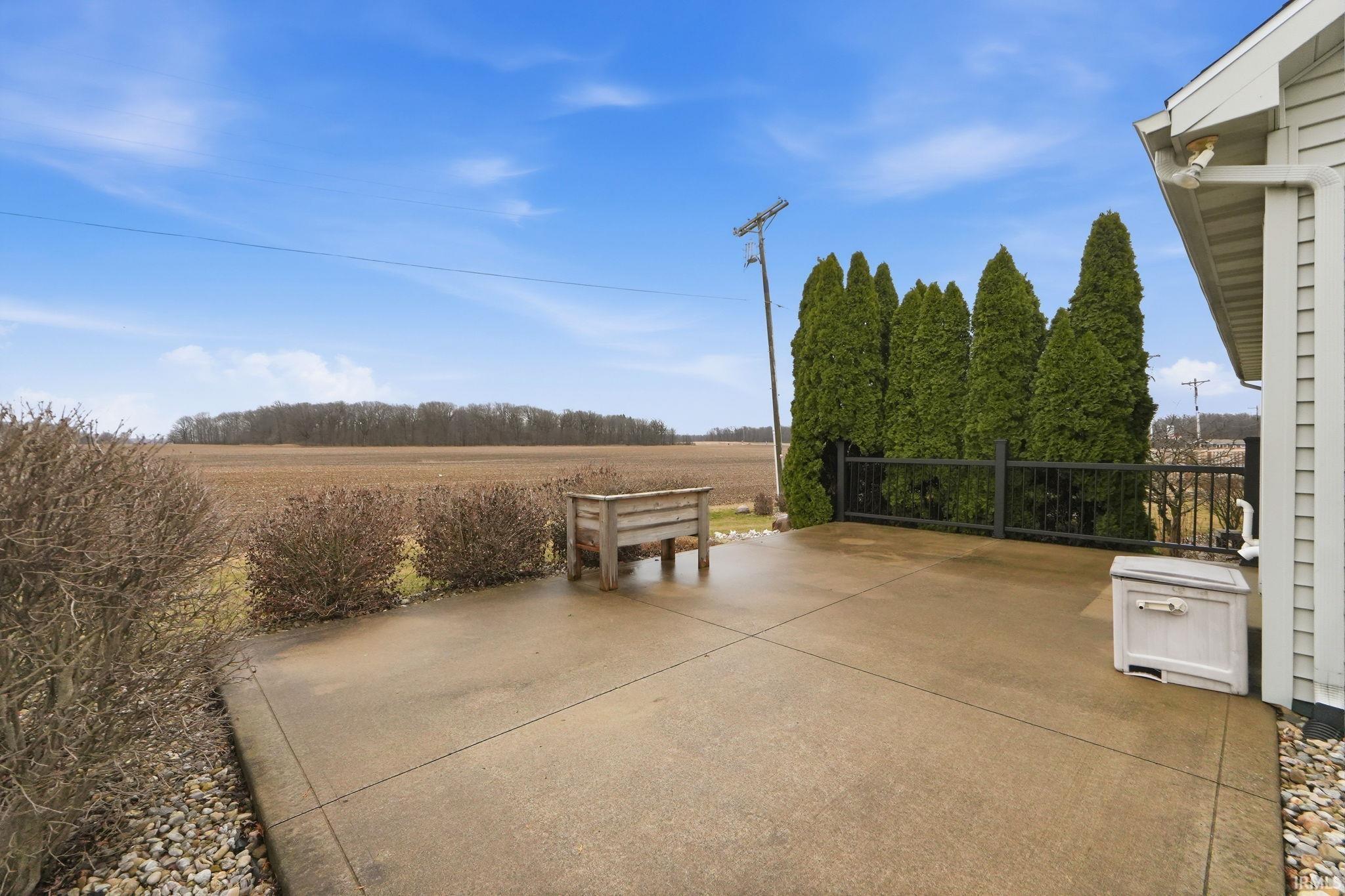 View of patio with a rural view