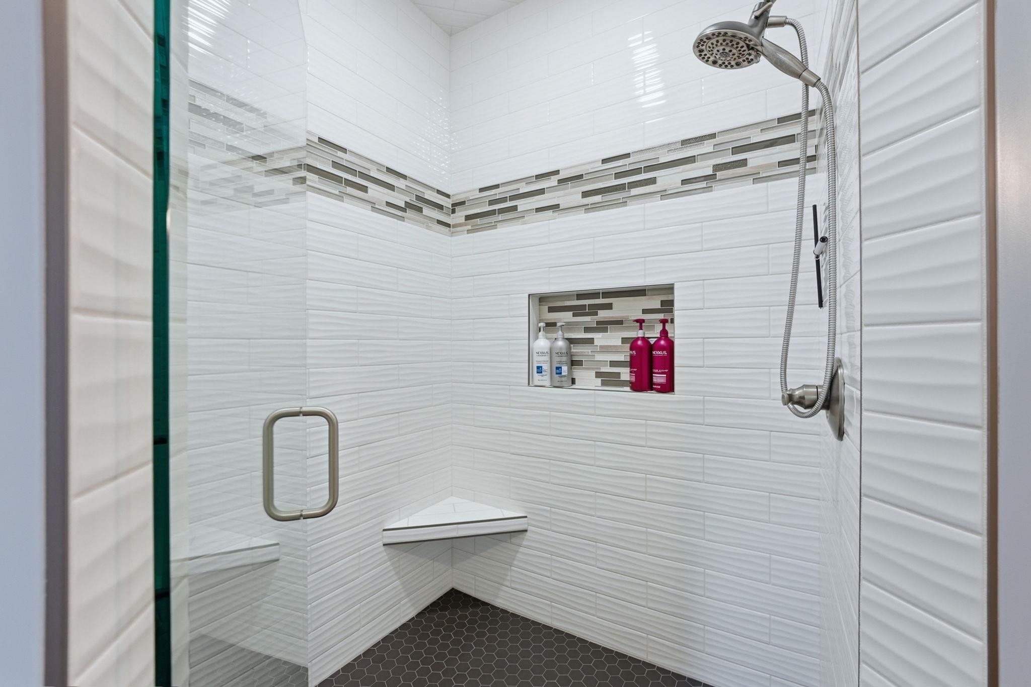 Full bathroom with a stall shower