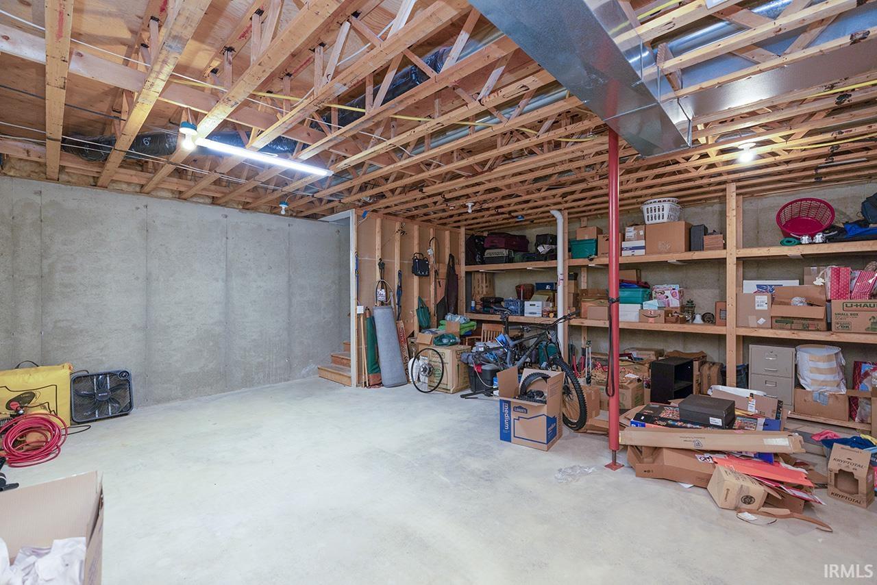 Unfinished below grade area with stairway