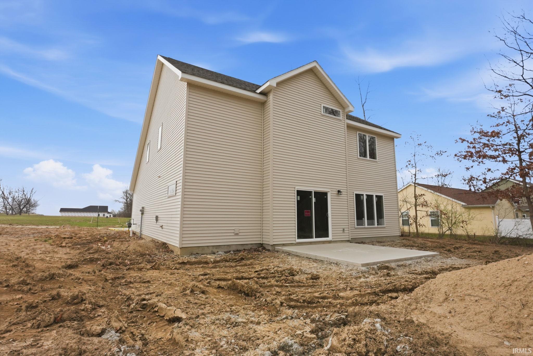 Back of property with a patio area