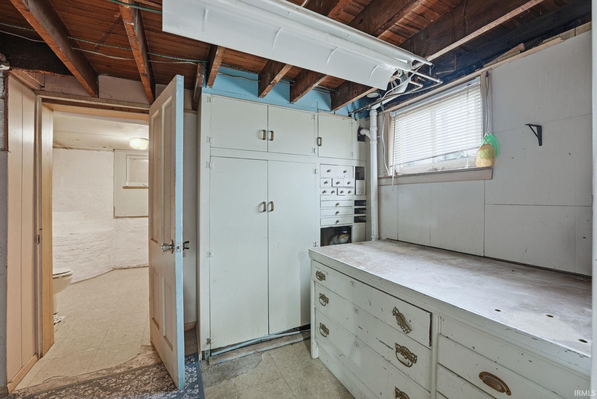 Below grade area with light floors