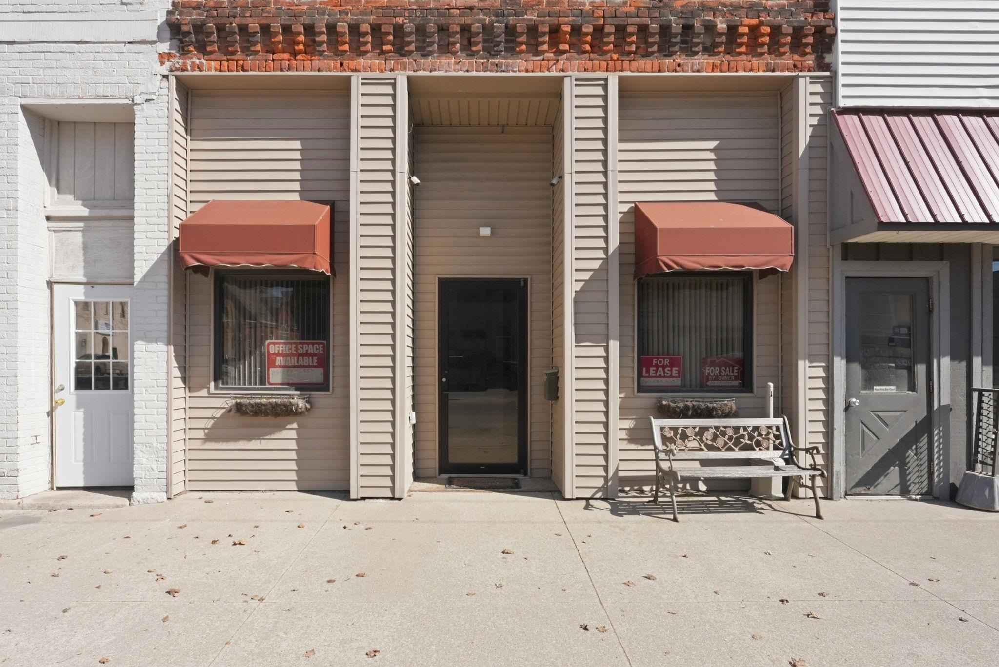 Property entrance with brick siding