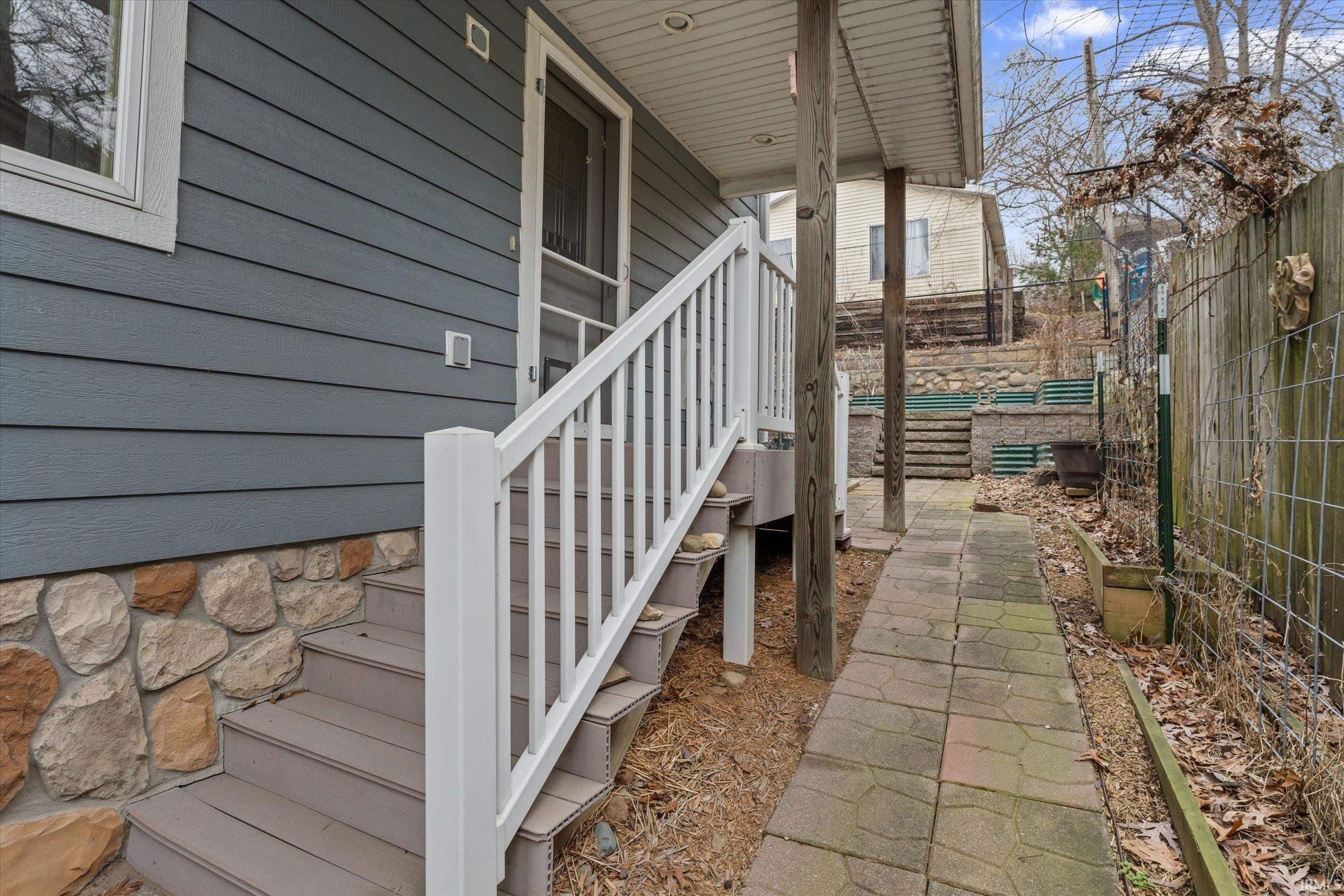 View of patio featuring stairway
