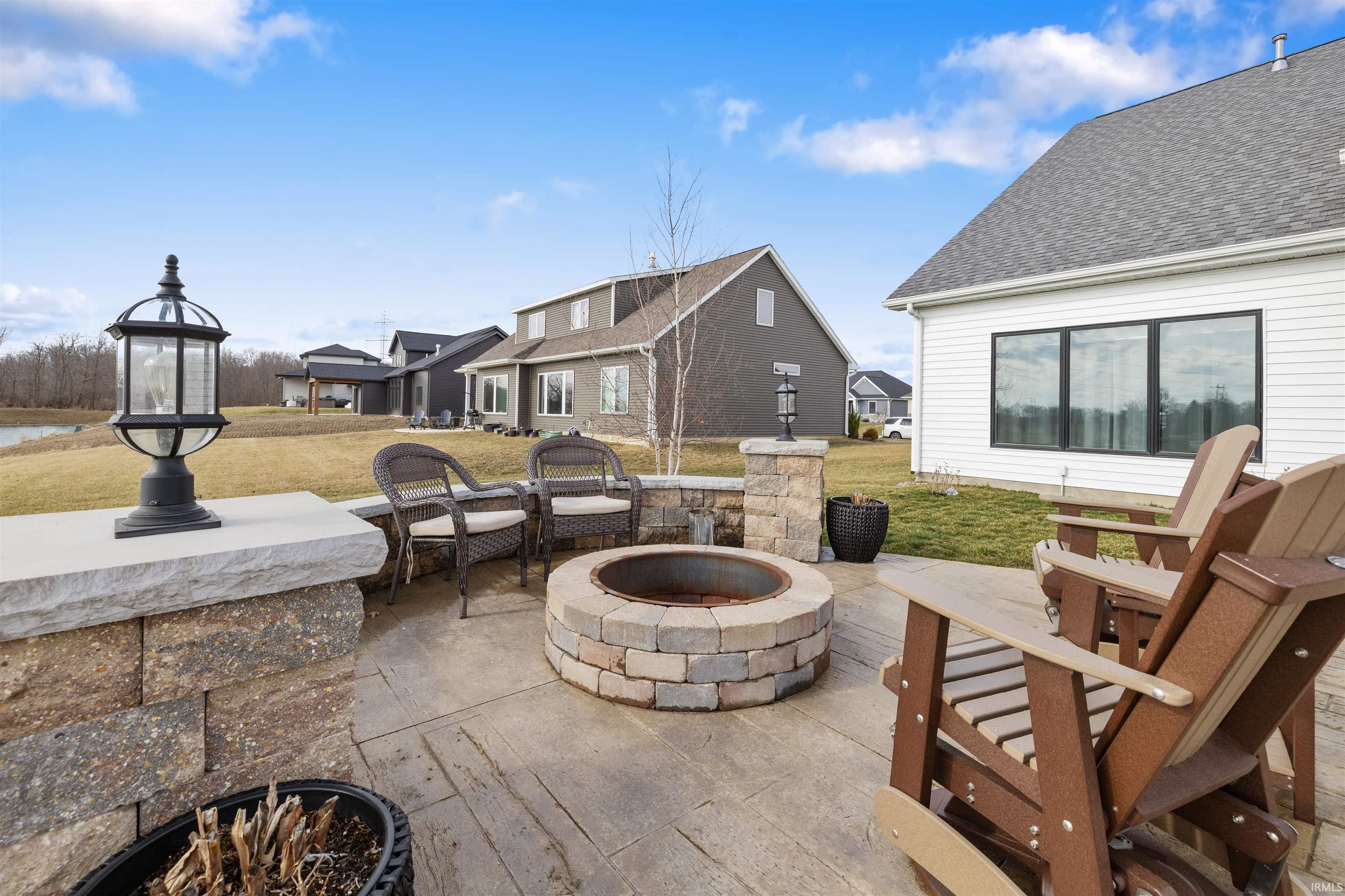 View of patio featuring a fire pit