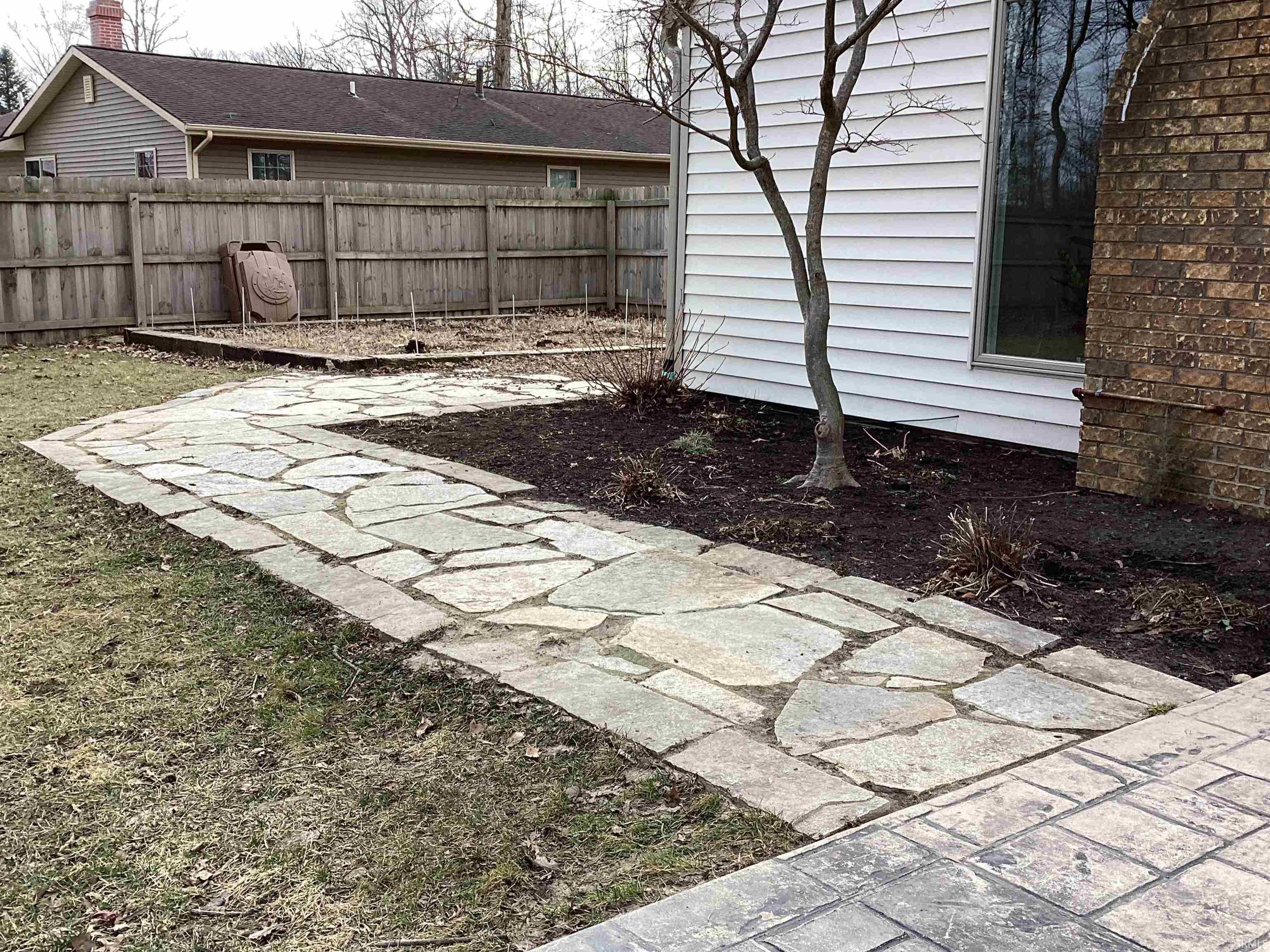 View of fenced backyard
