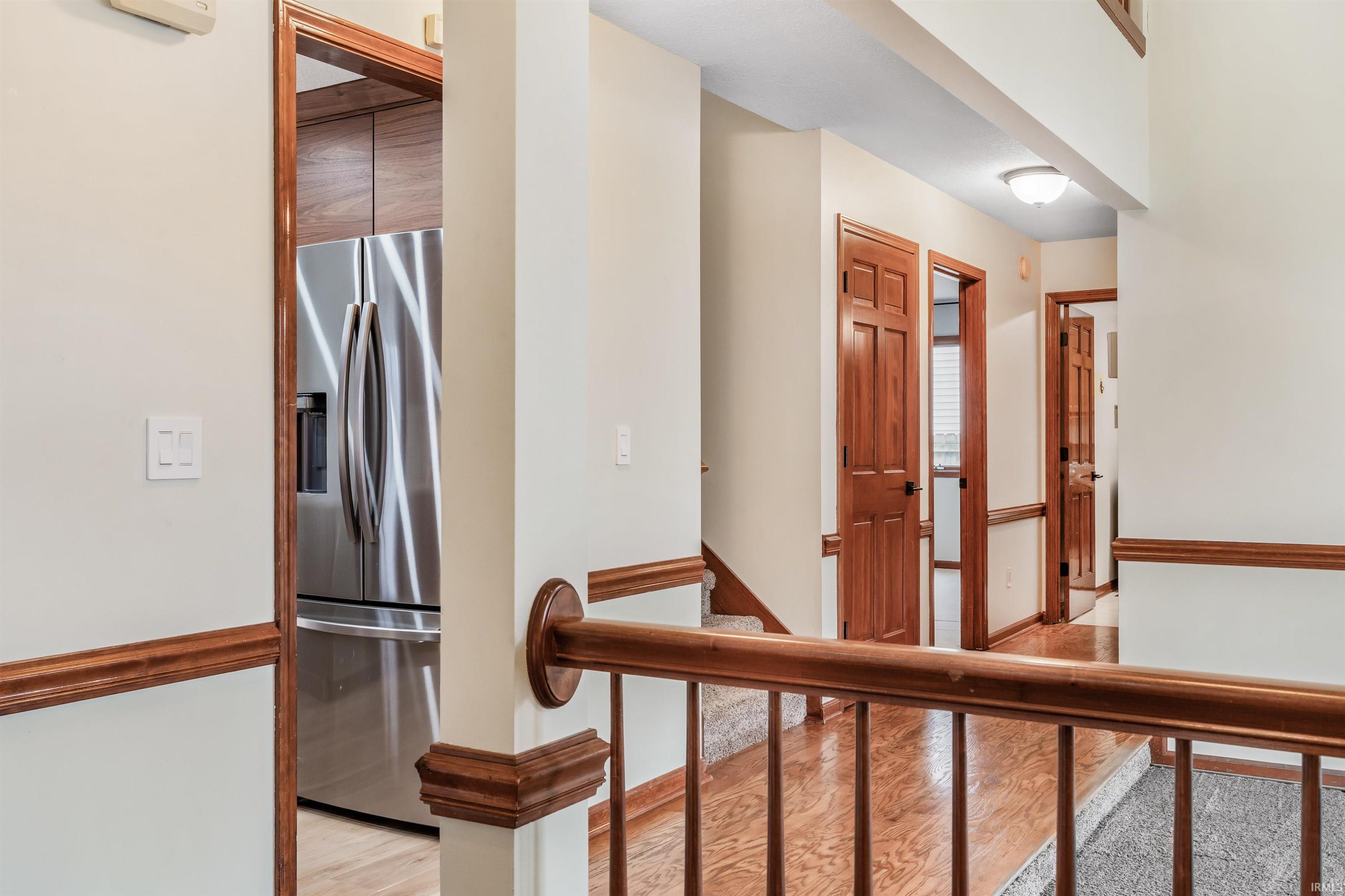 Hallway featuring baseboards