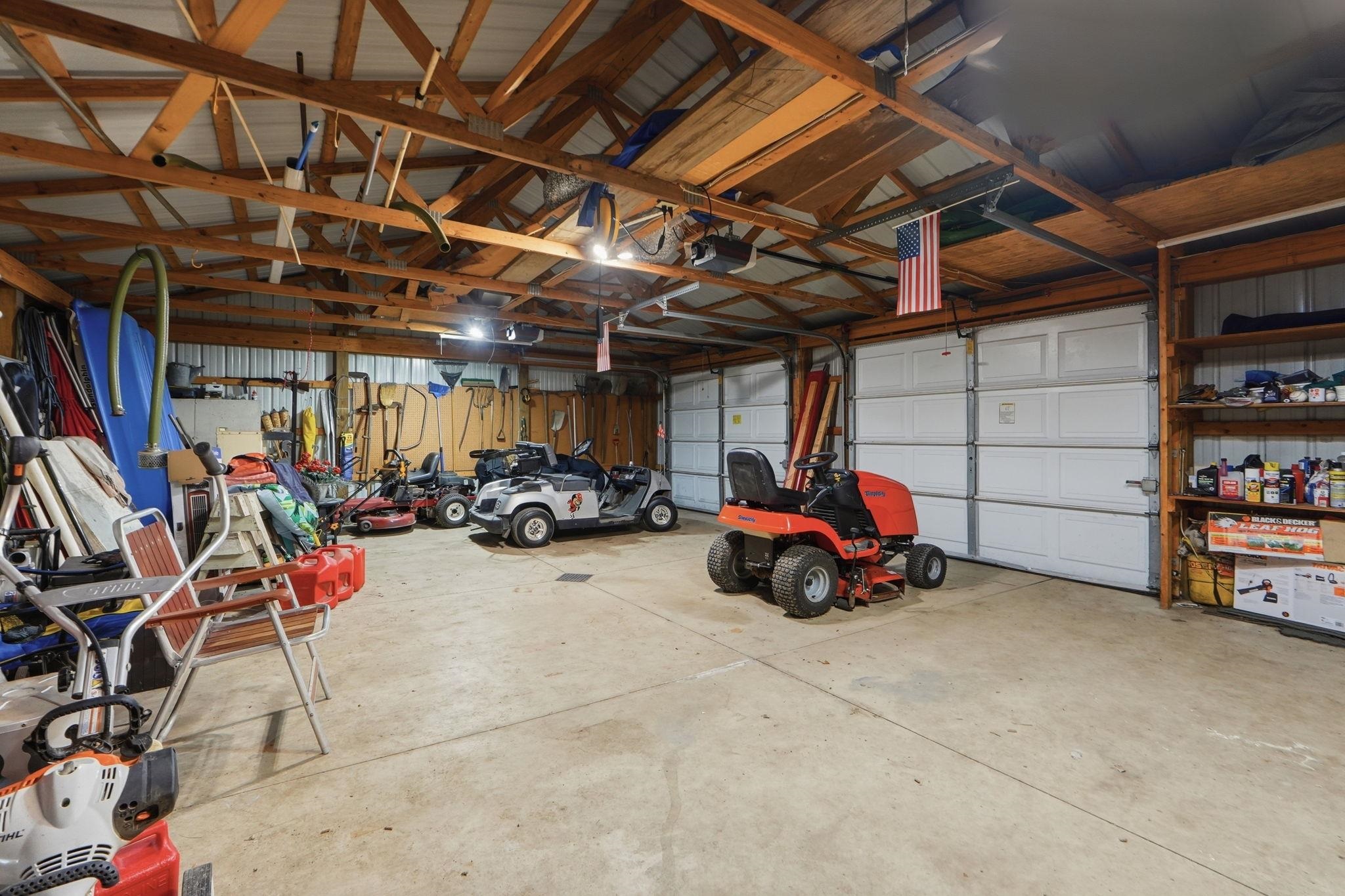 Garage featuring a garage door opener
