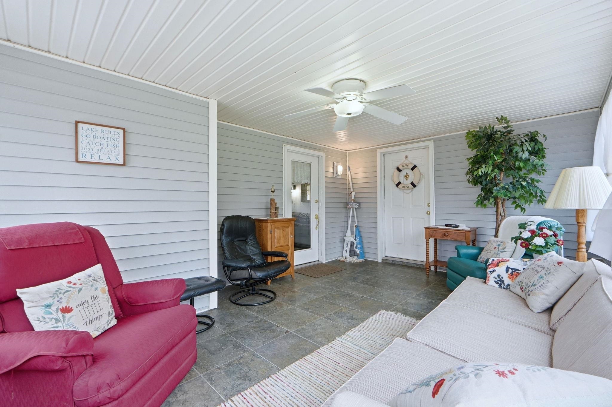 Sunroom featuring ceiling fan and an outdoor lounge area