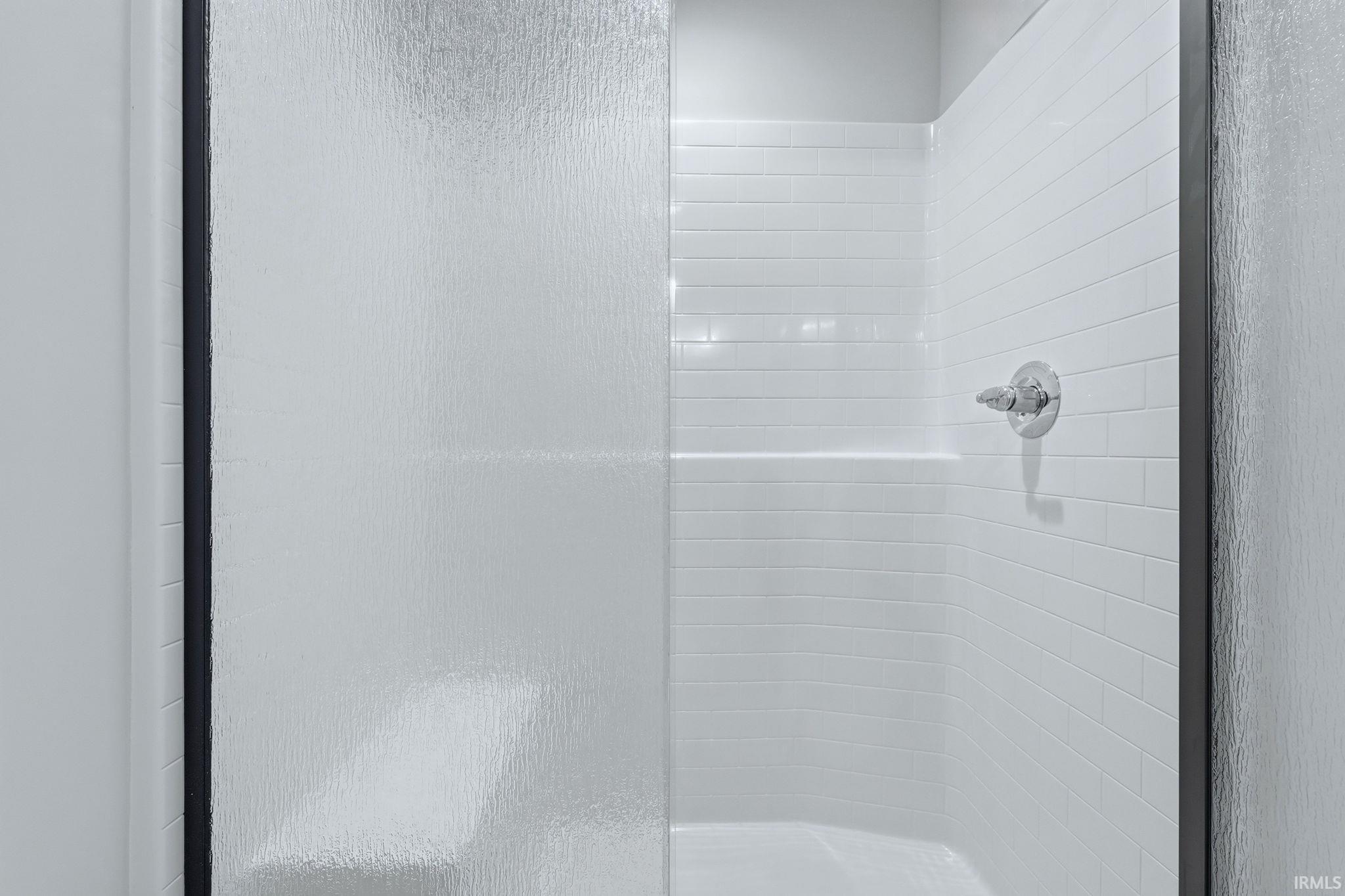 Bathroom featuring a stall shower