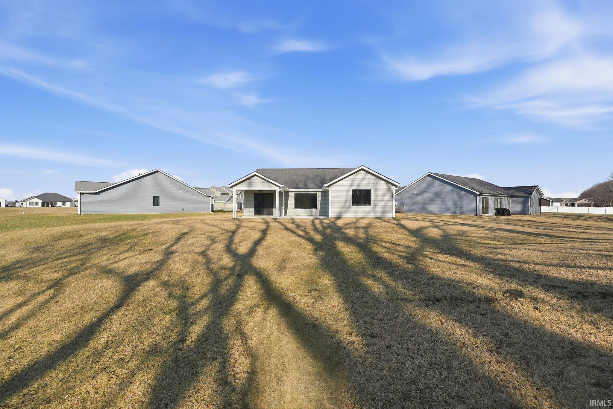 View of front of house with a front lawn