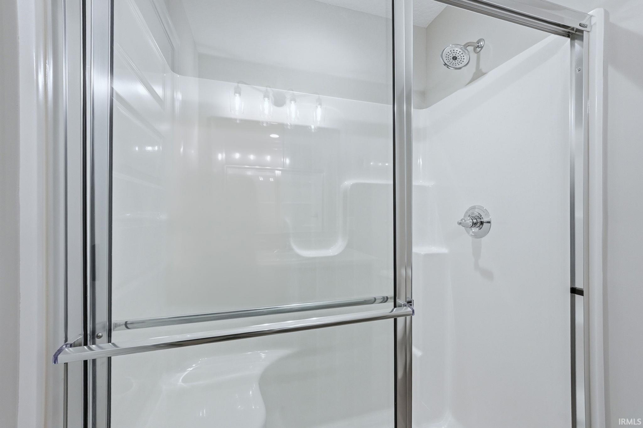 Bathroom featuring a stall shower
