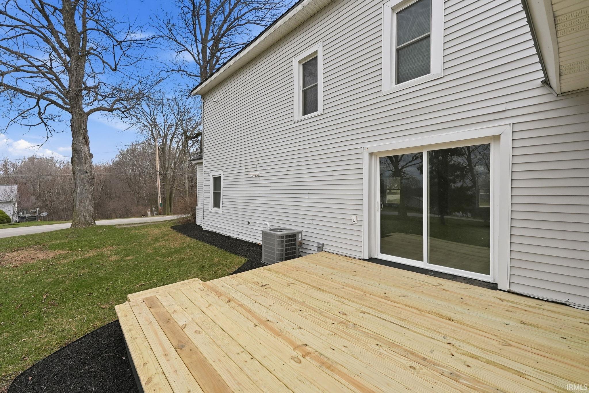 Deck featuring a yard