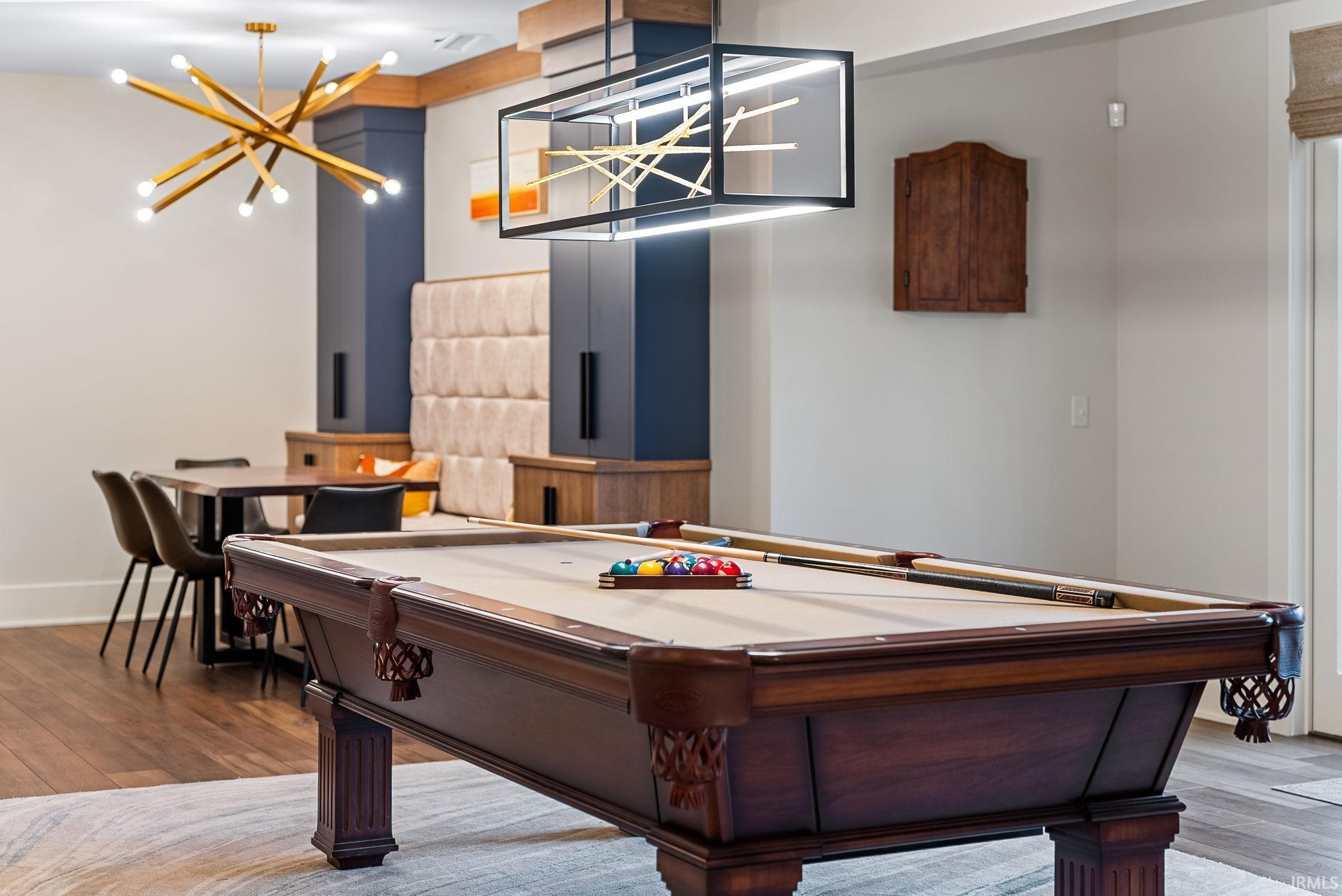 Rec room featuring wood-type flooring and billiards