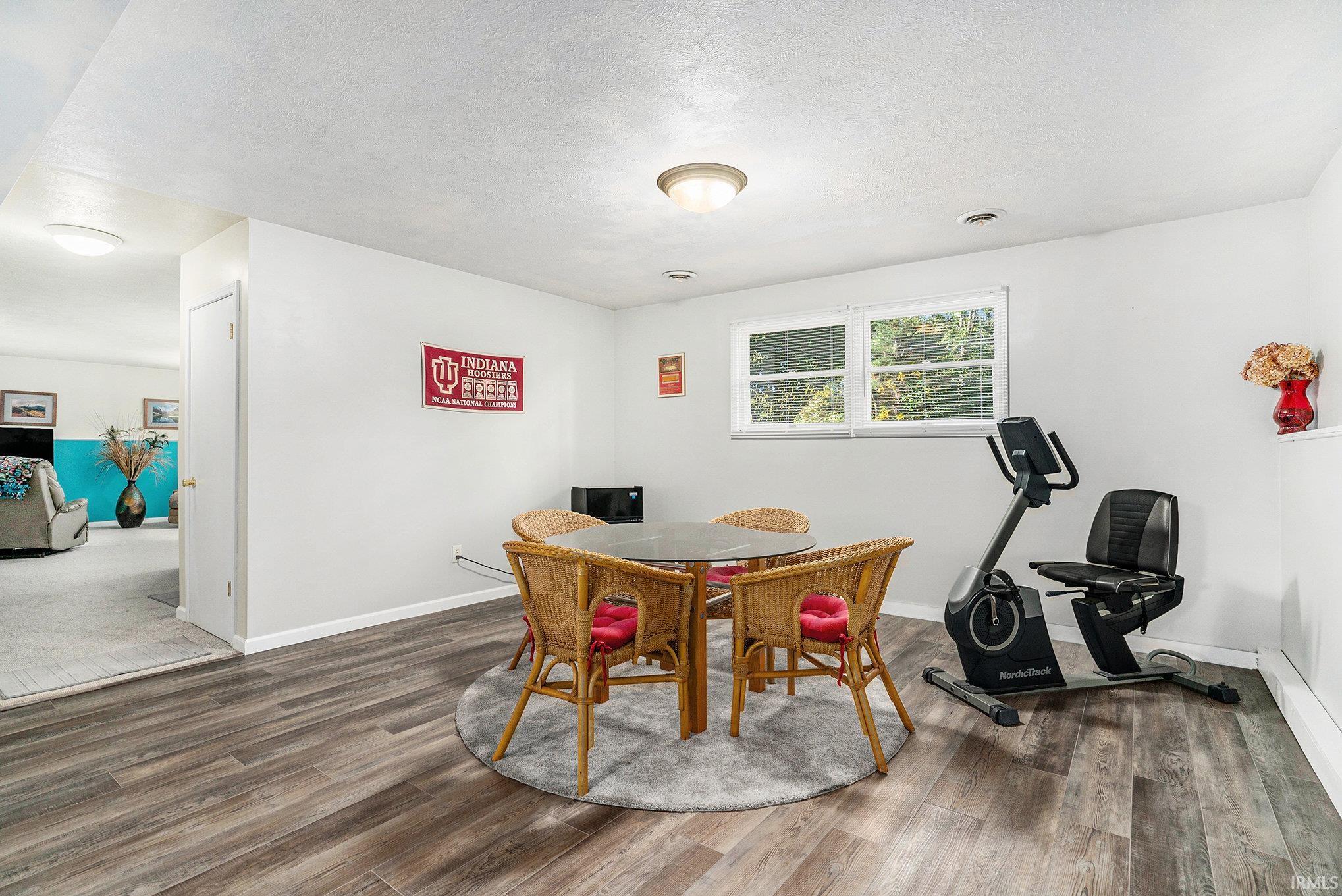 Dining space featuring wood finished floors