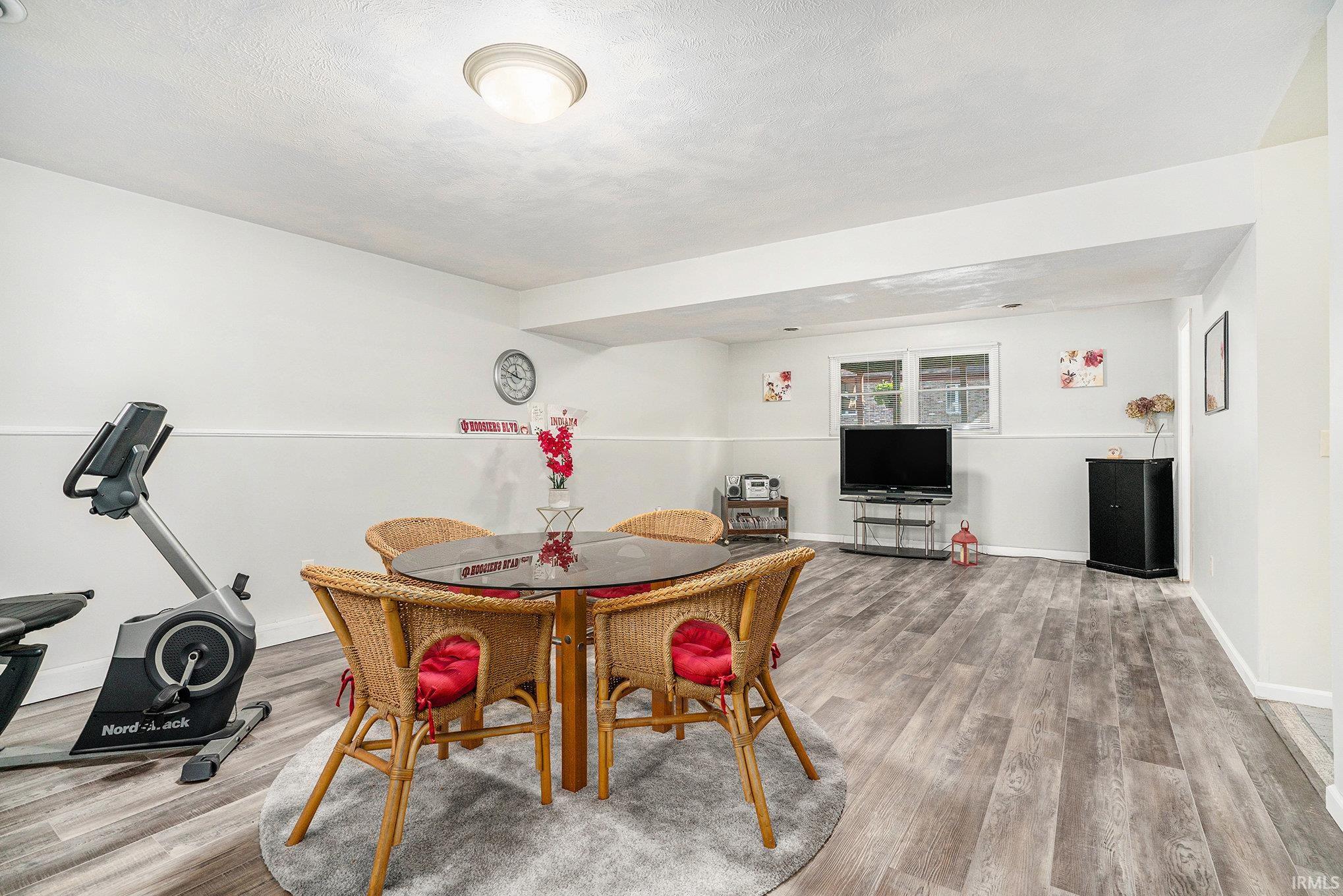 Dining area with light wood finished floors