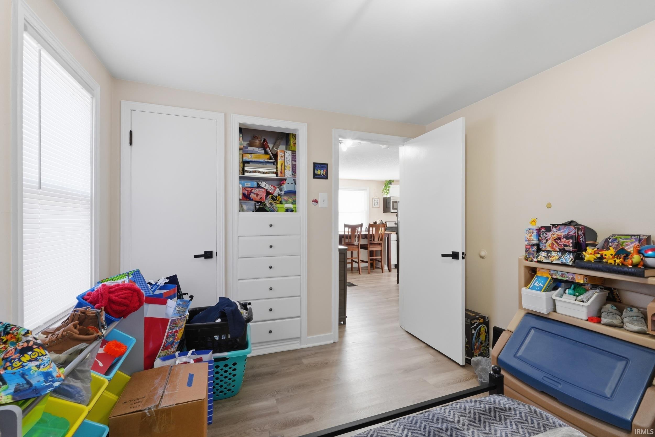 Playroom featuring light wood-style flooring