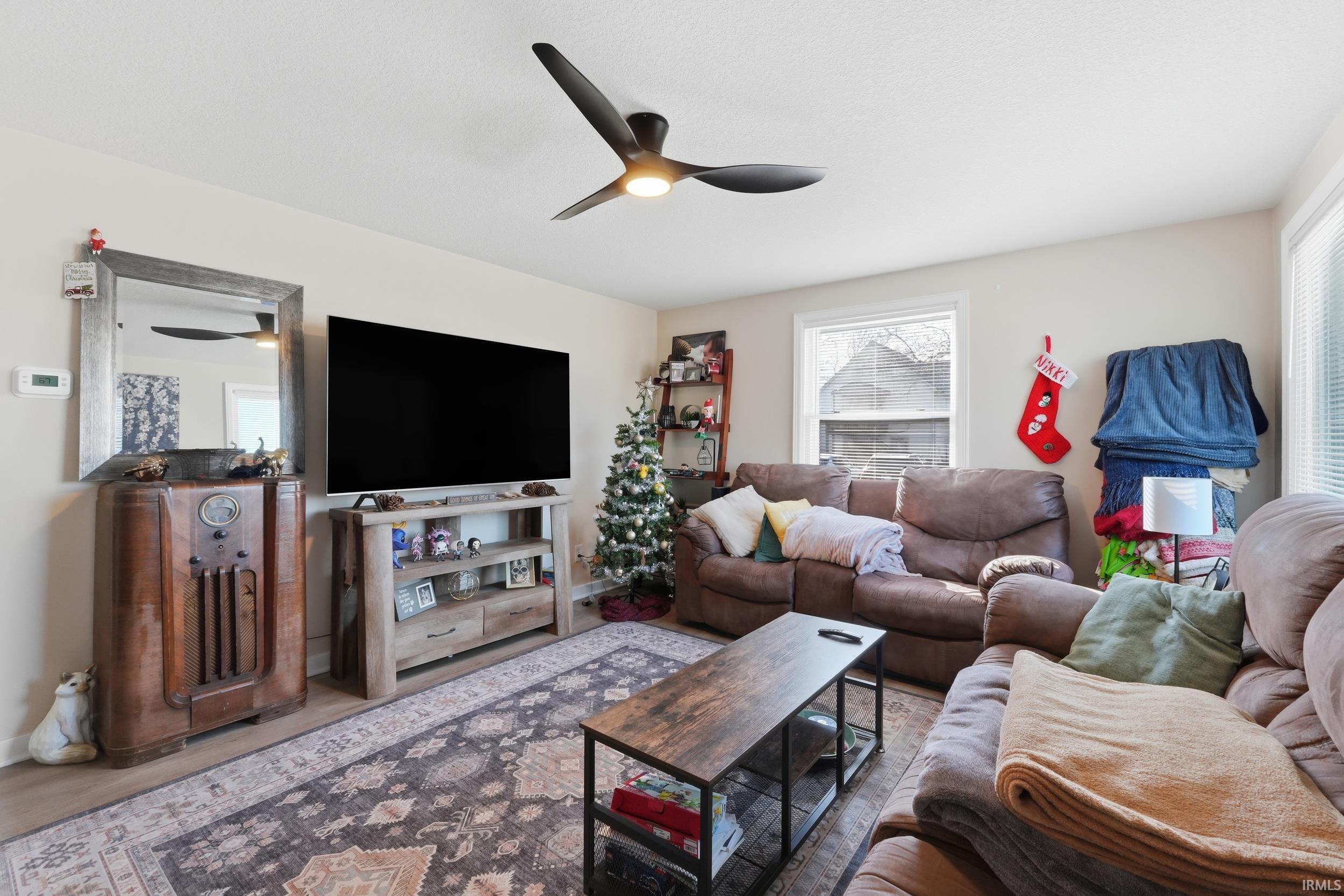 Living area with a ceiling fan