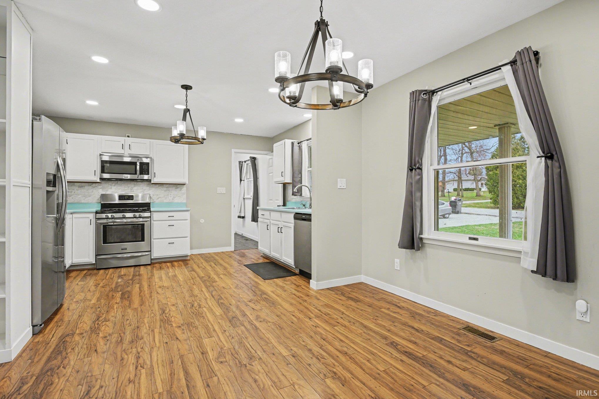 Dining Area open between the kitchen and living room