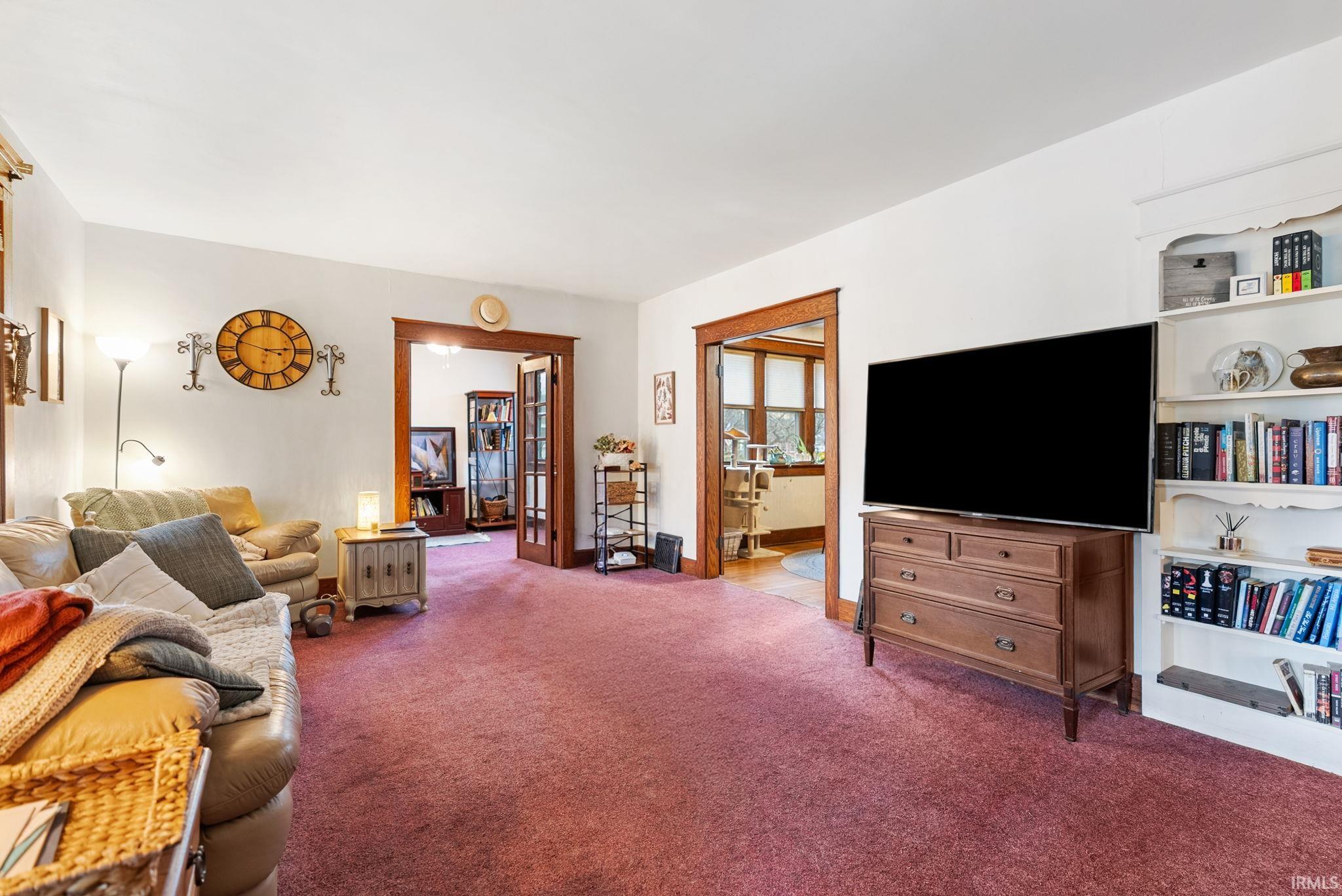 Living area featuring carpet