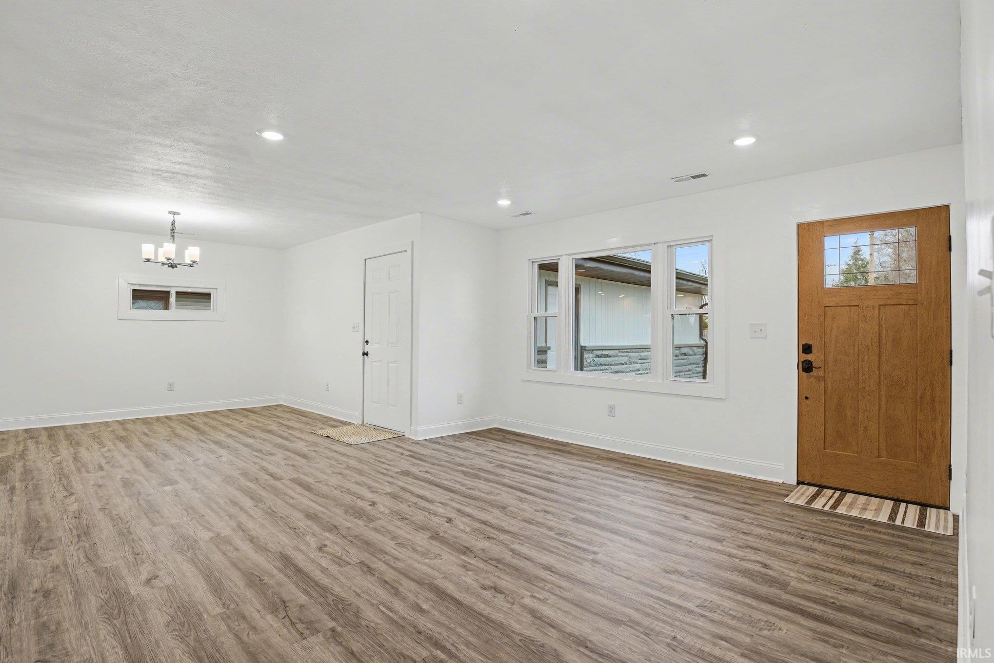Living room featuring wood finished floors