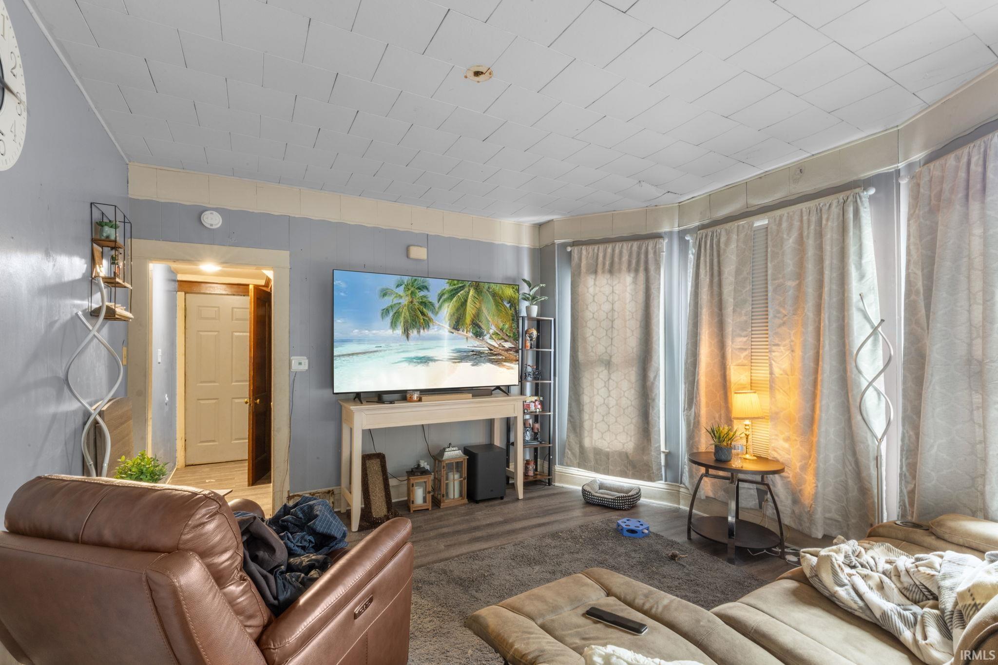Living room featuring wood finished floors