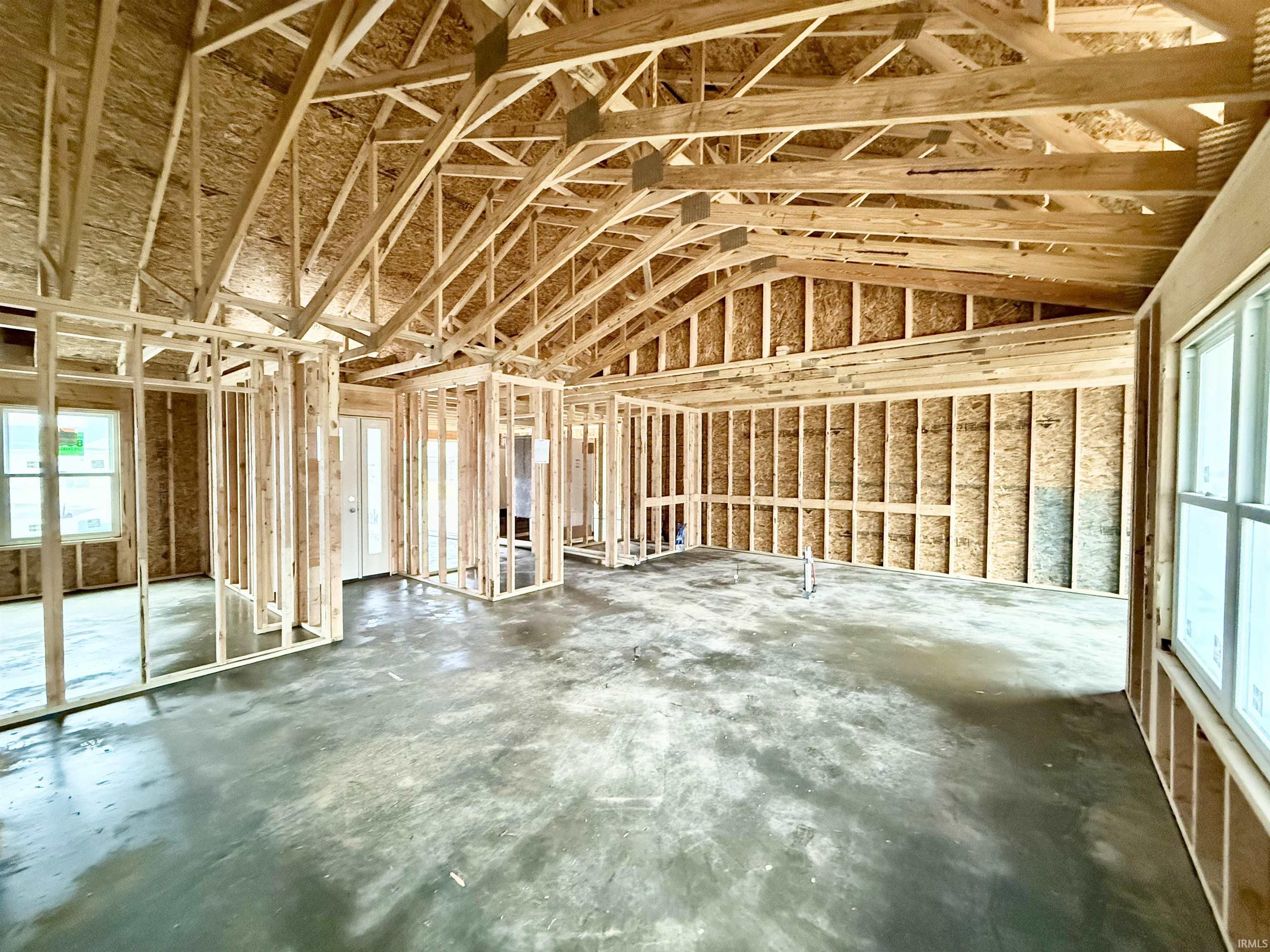 Miscellaneous room featuring lofted ceiling