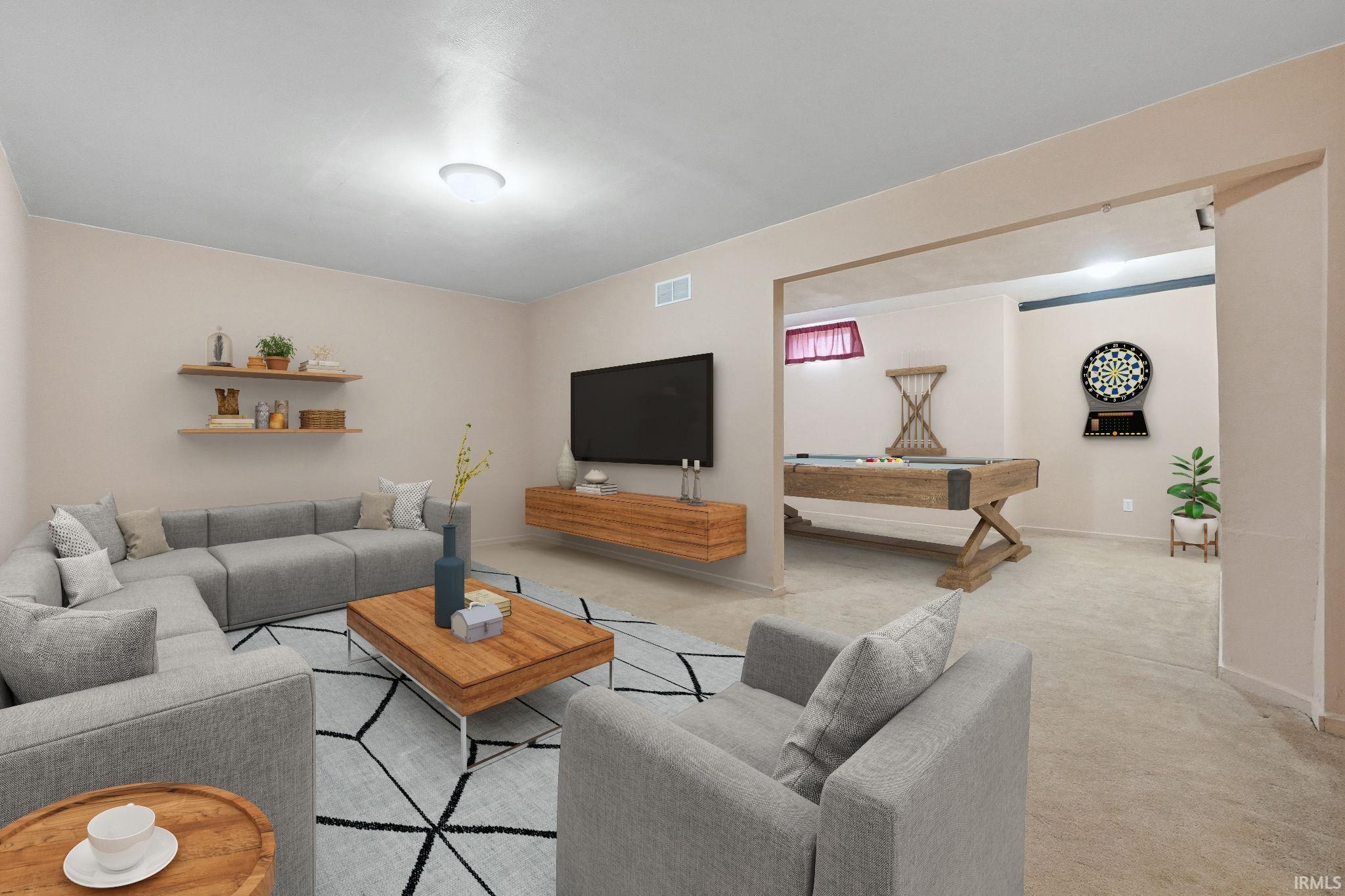Living room featuring light colored carpet and pool table