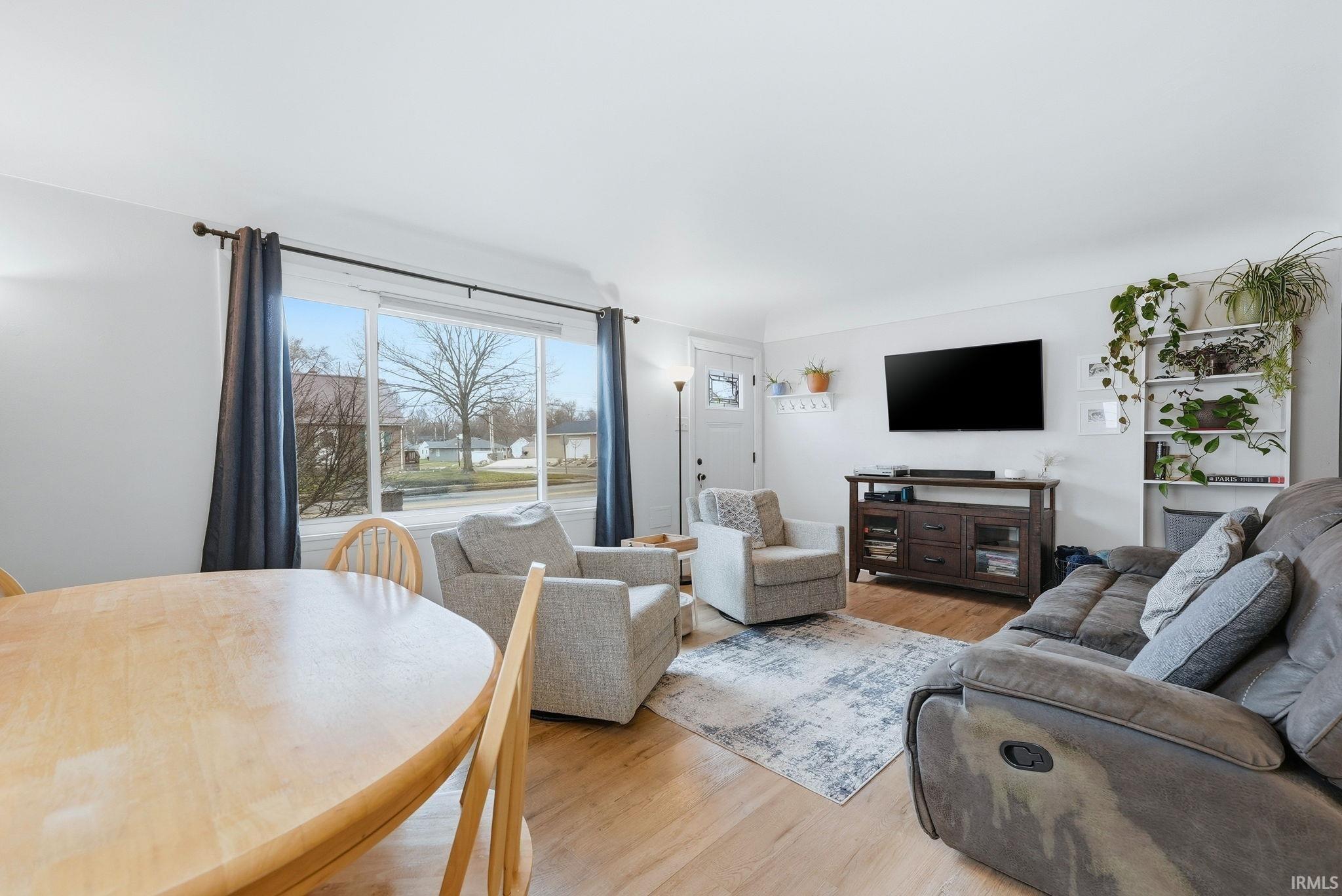 Living area featuring light wood finished floors