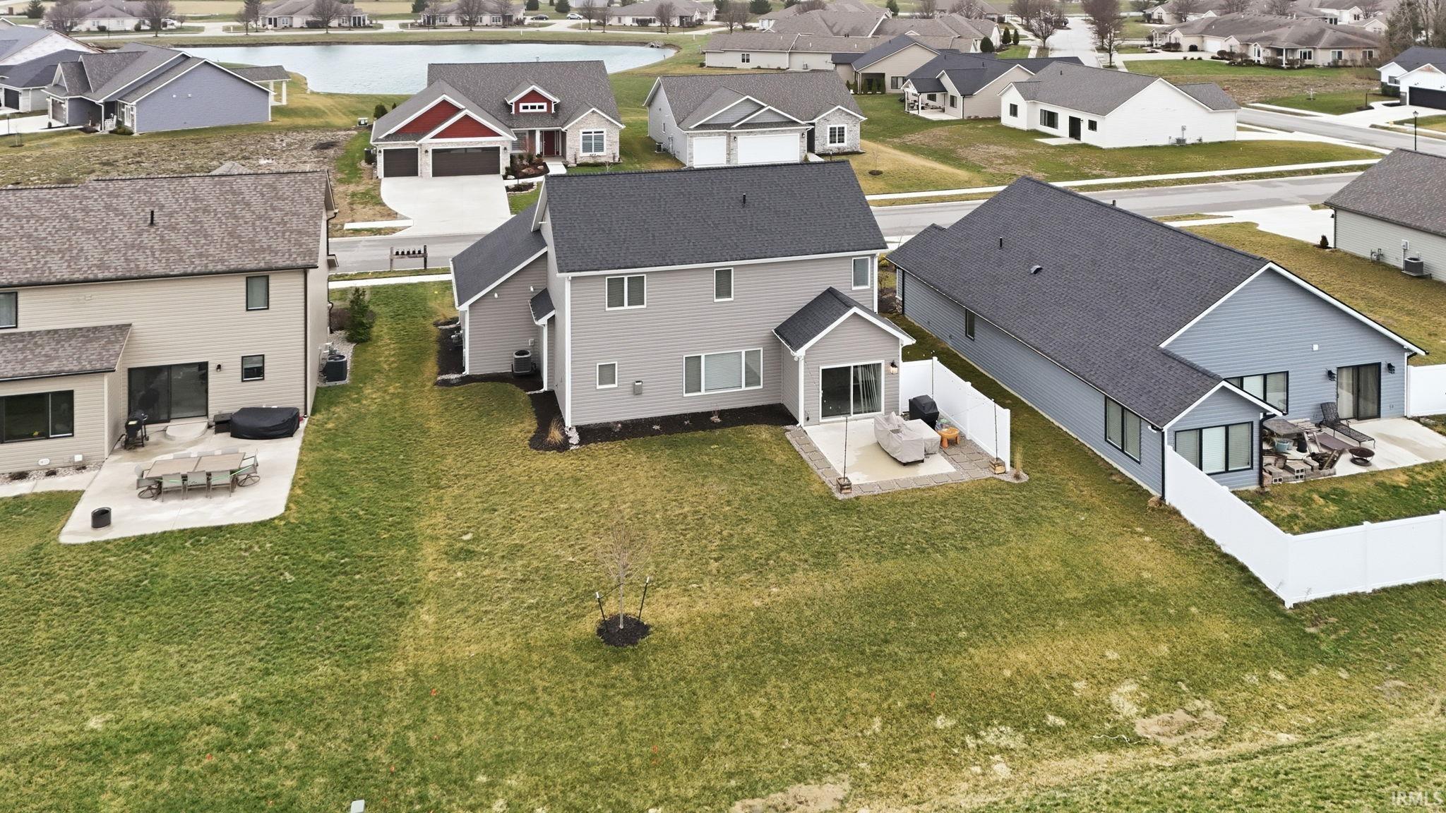 Aerial view of residential area with a nearby body of water