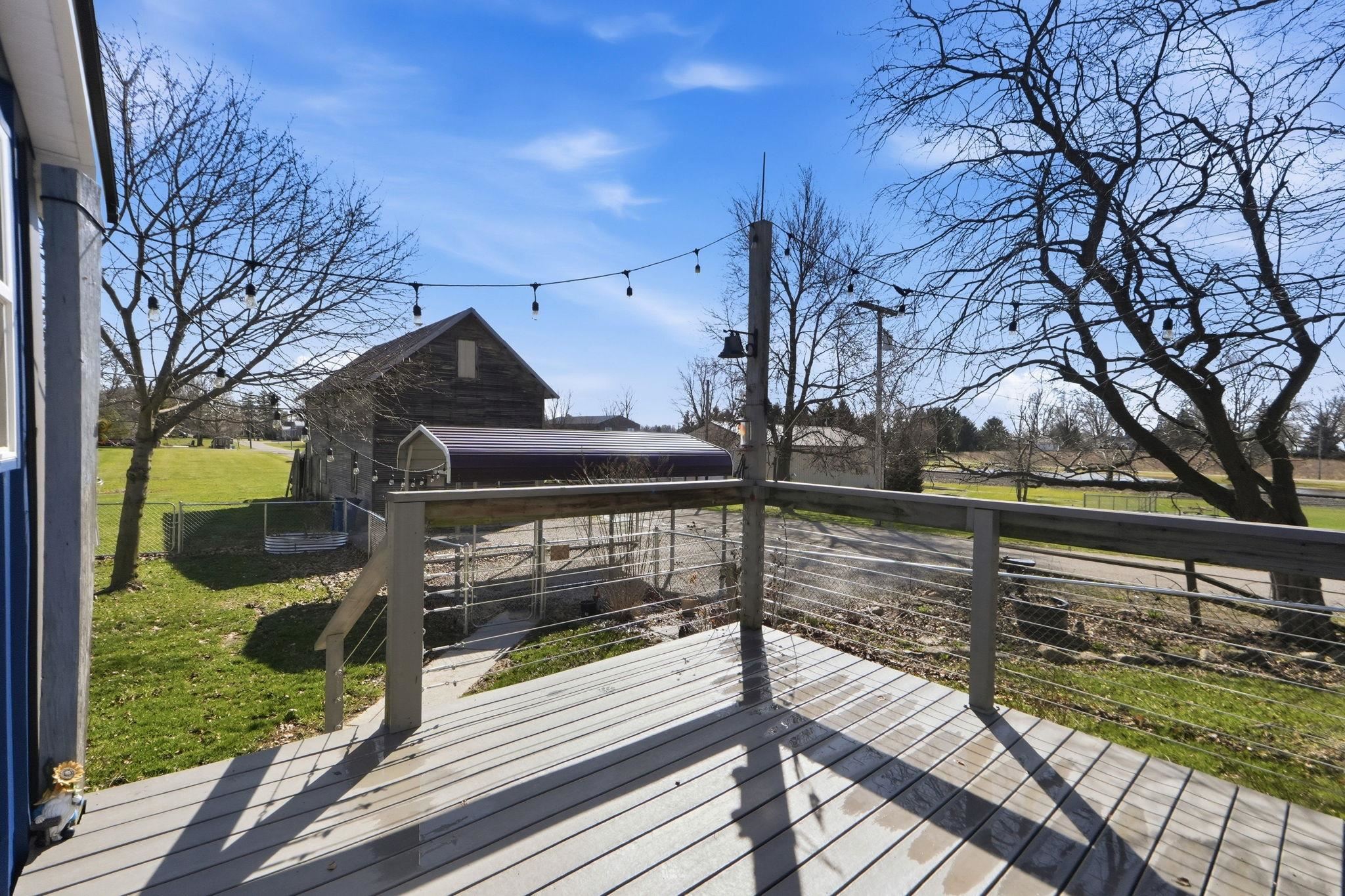 Wooden deck with a yard