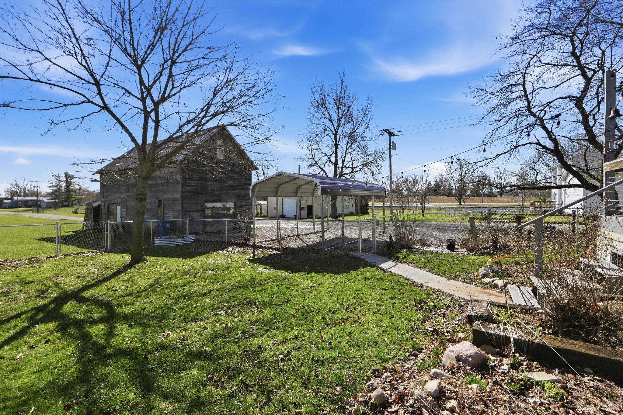 View of yard featuring a carport