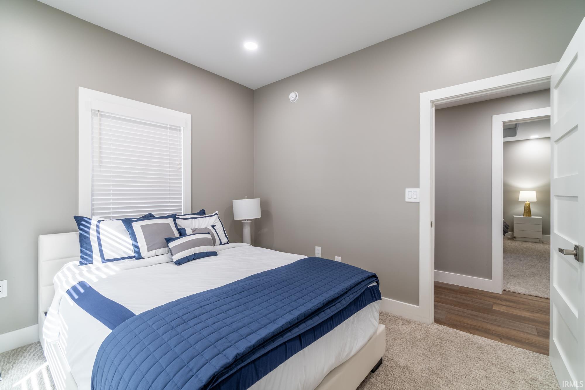 Bedroom featuring carpet and recessed lighting